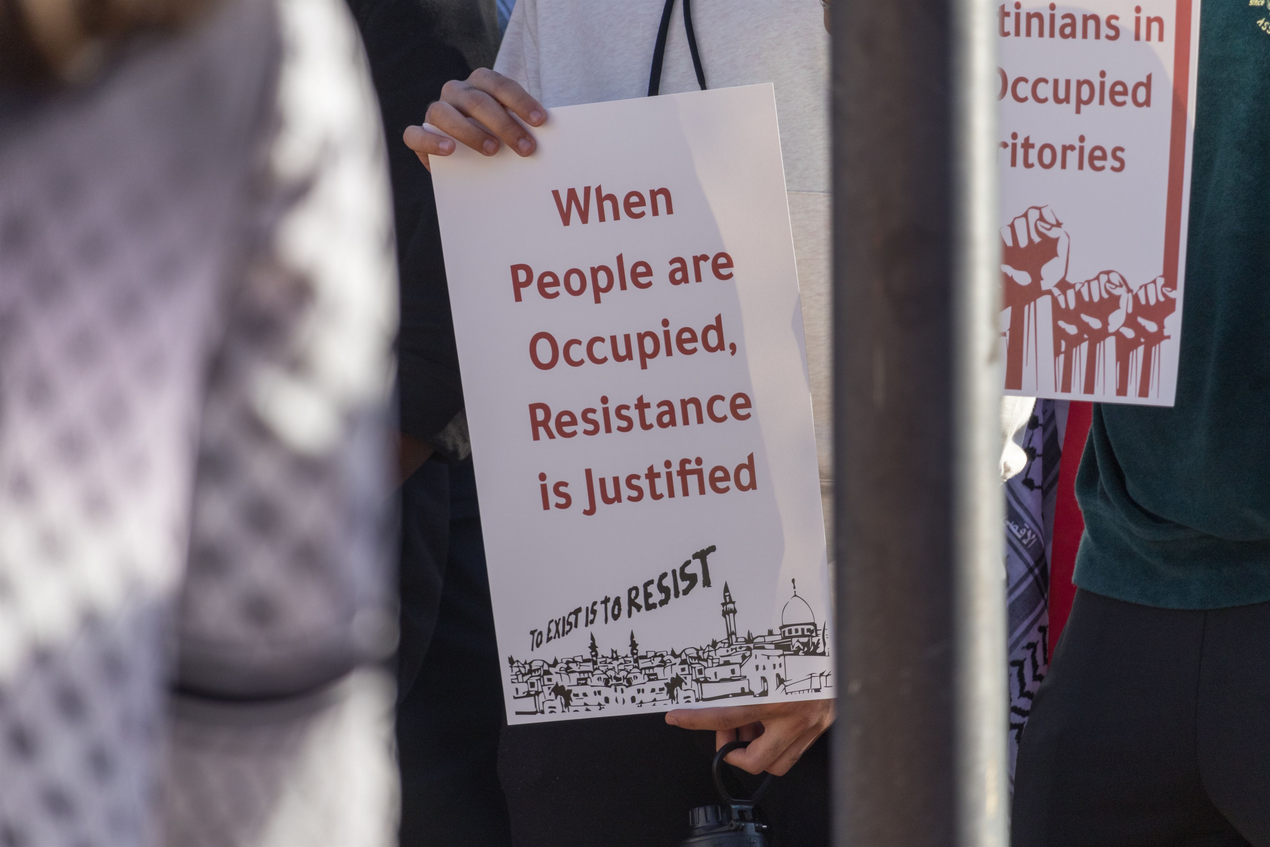 A sign reads "When People are Occupied, Resistance is Justified" at a pro-Palestine rally in the Student Center Quad.
Sal DiMaggio | The Montclarion