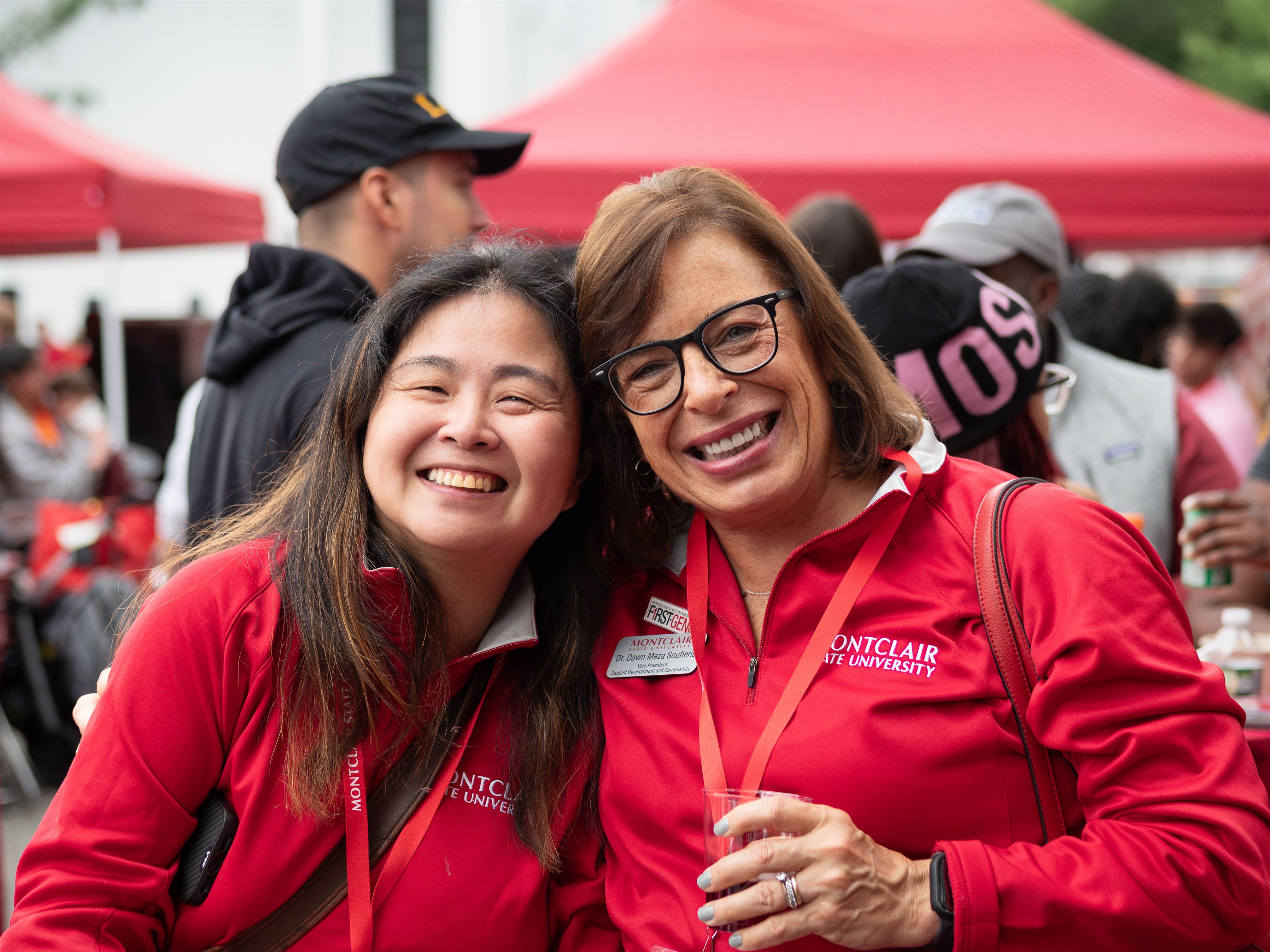 Vice President Dawn Soufleris poses with a person during Homecoming festivities. 
Dani Mazariegos | The Montclarion