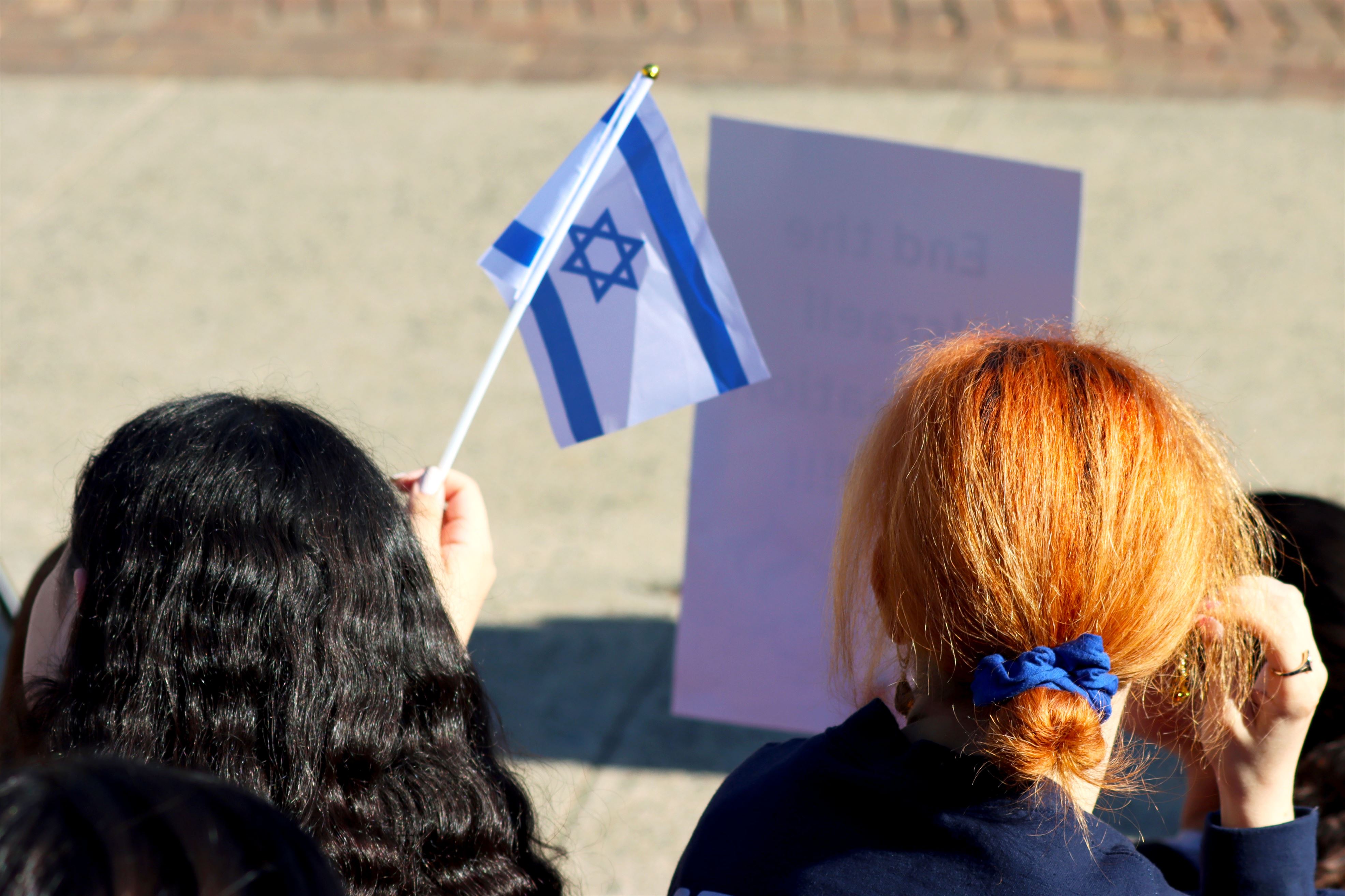 Counter-protestors wave the Israel flag outside the Student Center quad at Montclair State University. Photo by Claudia Martillo.