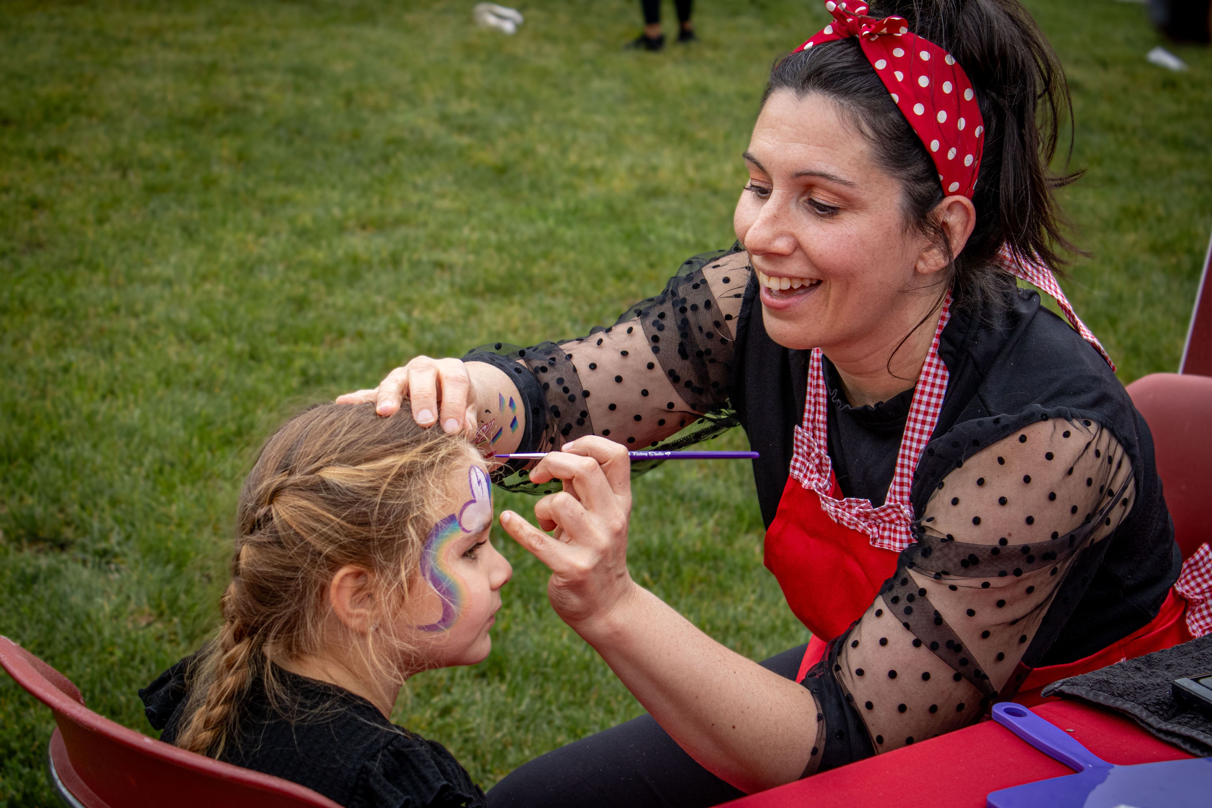 A child gets her face painted. 
Dani Mazariegos | The Montclarion