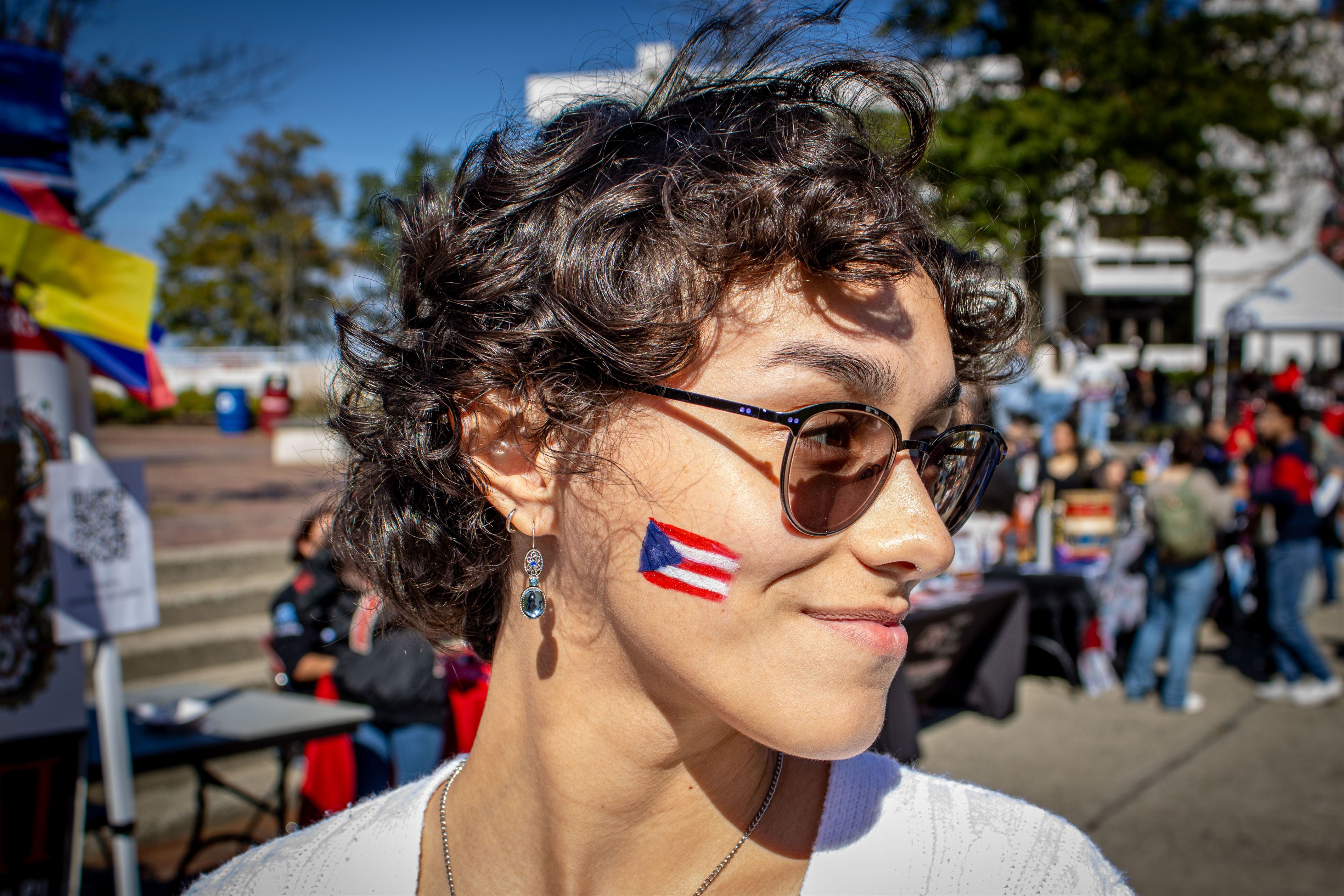 Photo of Jolene Dejesus, sophomore Psychology major, with a Puerto Rican flag painted on her cheek. Dani Mazariegos | The Montclarion