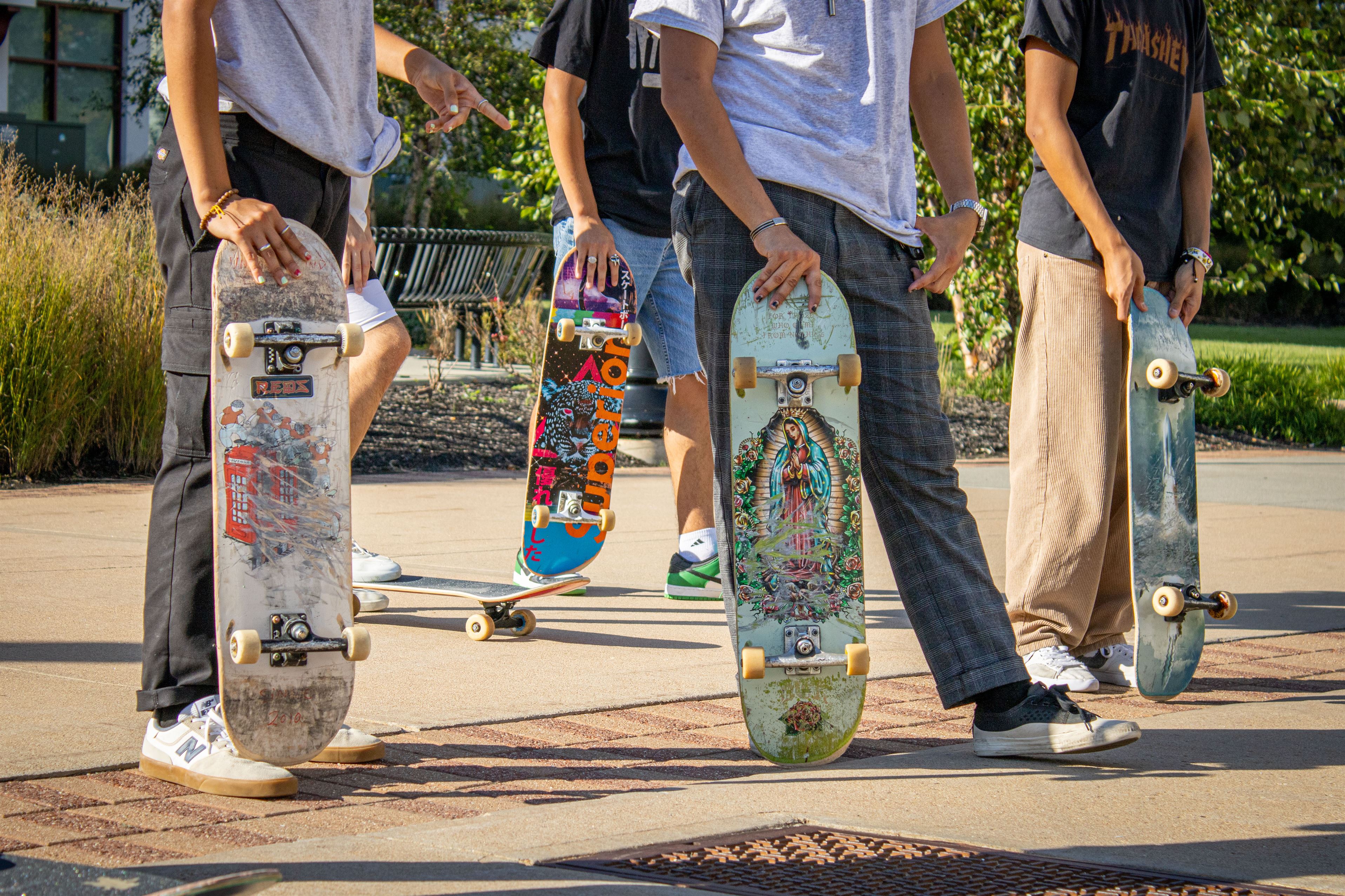 Photo of skating club members' personalized skateboards. 
Dani Mazariegos | The Montclarion