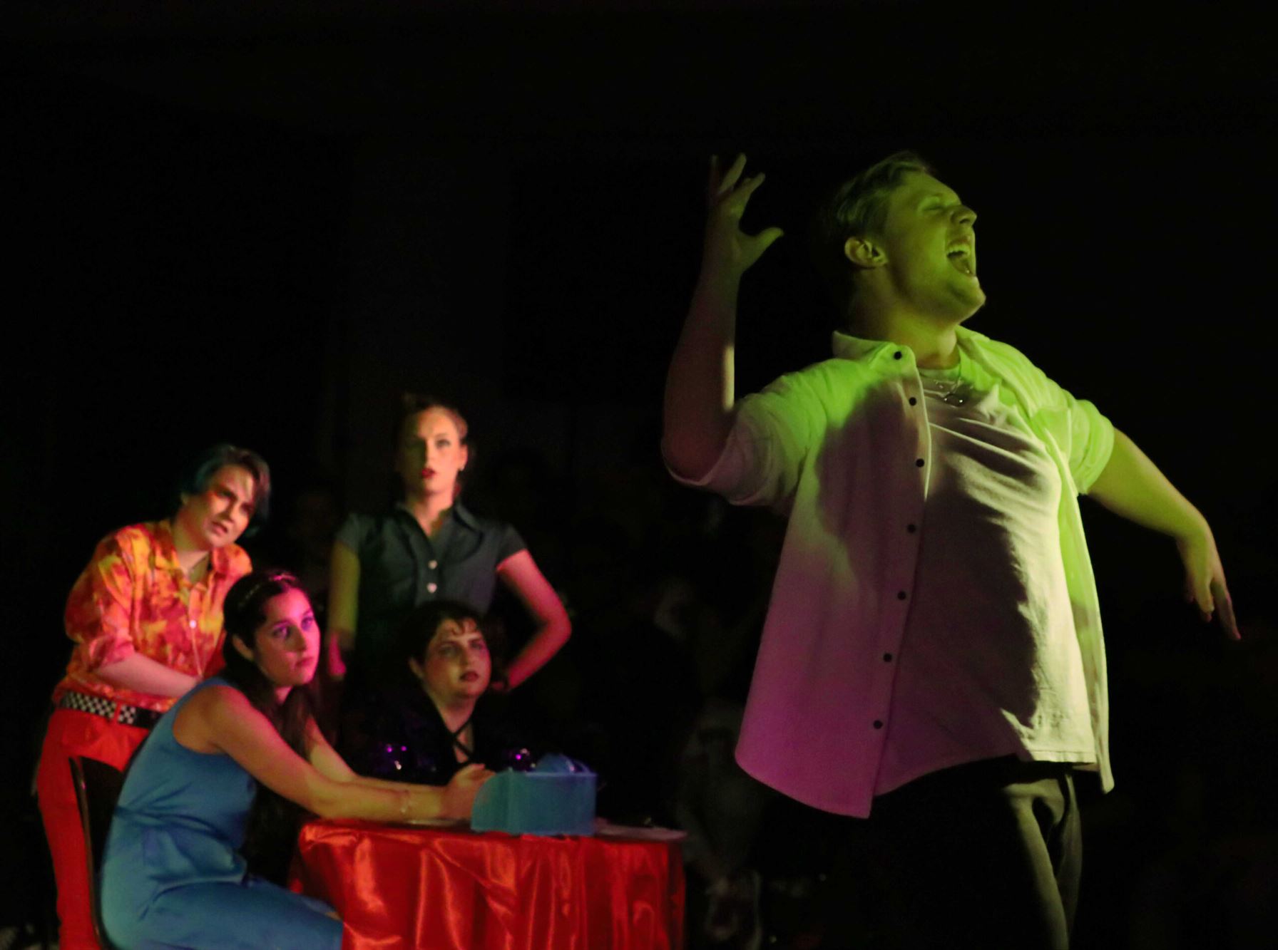 "Adam" played by Ian Love, performs a solo with fellow cast members Lea Dempsey, Stephanie Blais, Kayleigh Cole, and Beck Roth in the background. Victoria Howell | The Montclarion