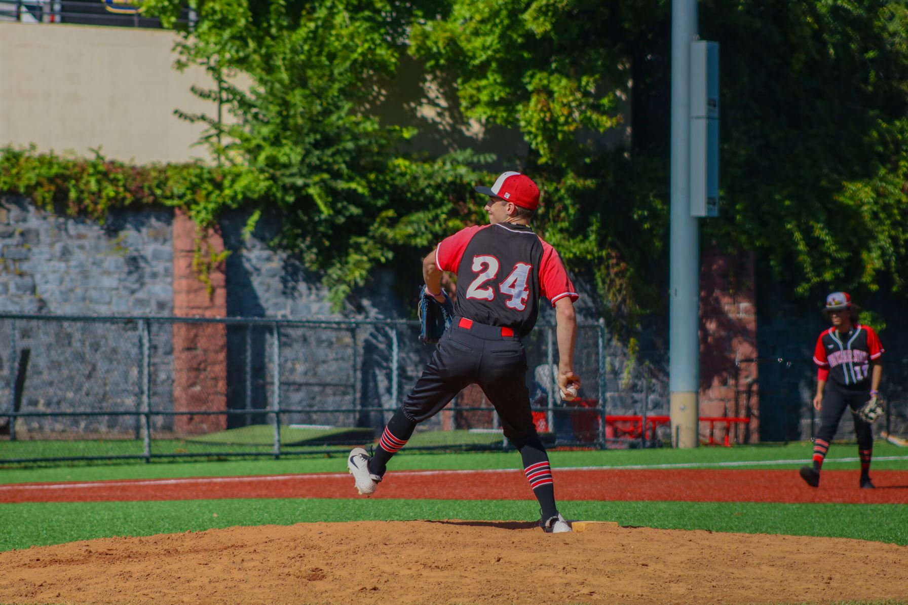 Pinckney winding up for a pitch for Montclair State University Club Baseball. Photo courtesy of Billy Pinckney