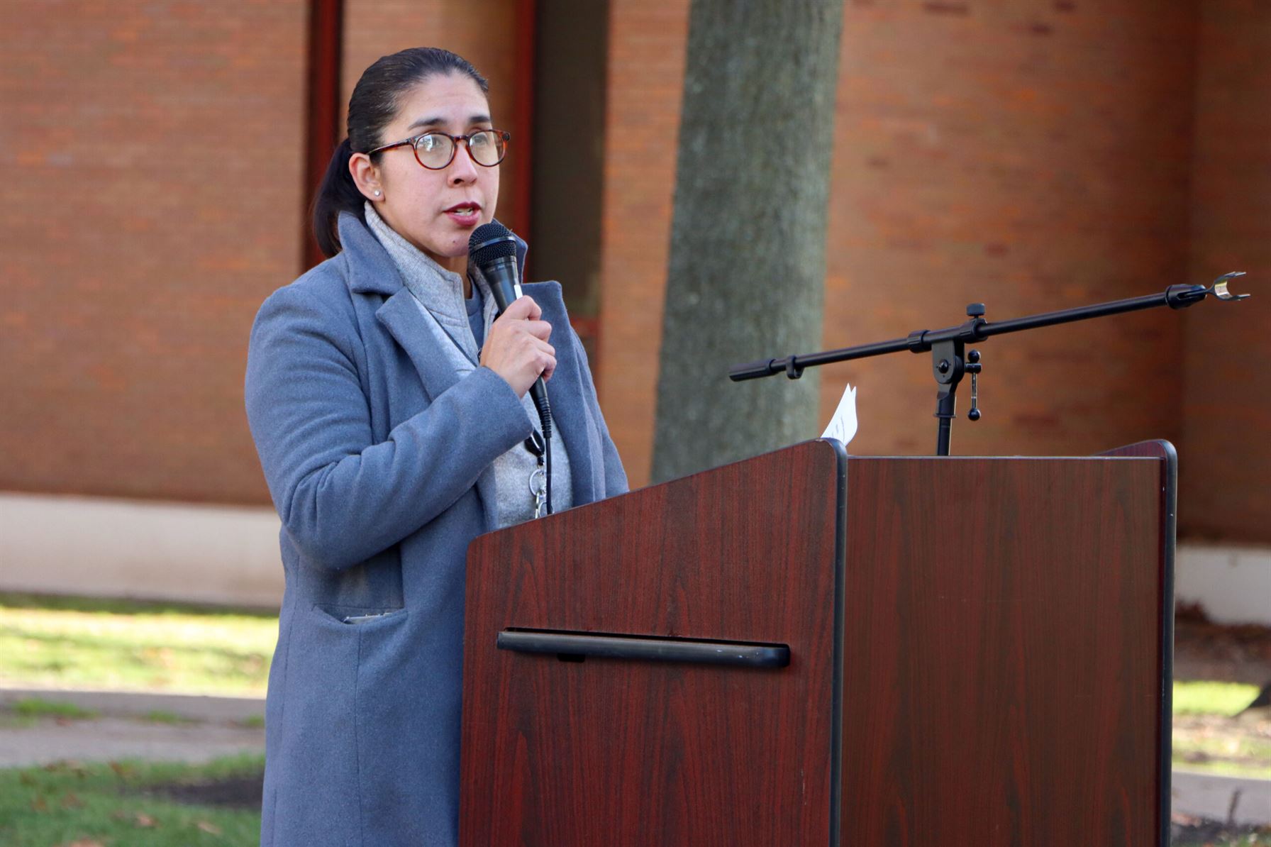 Adela Caceres, director of the office for social justice and diversity, welcomed the crowd to the ceremony. Claudia Martillo | The Montclarion
