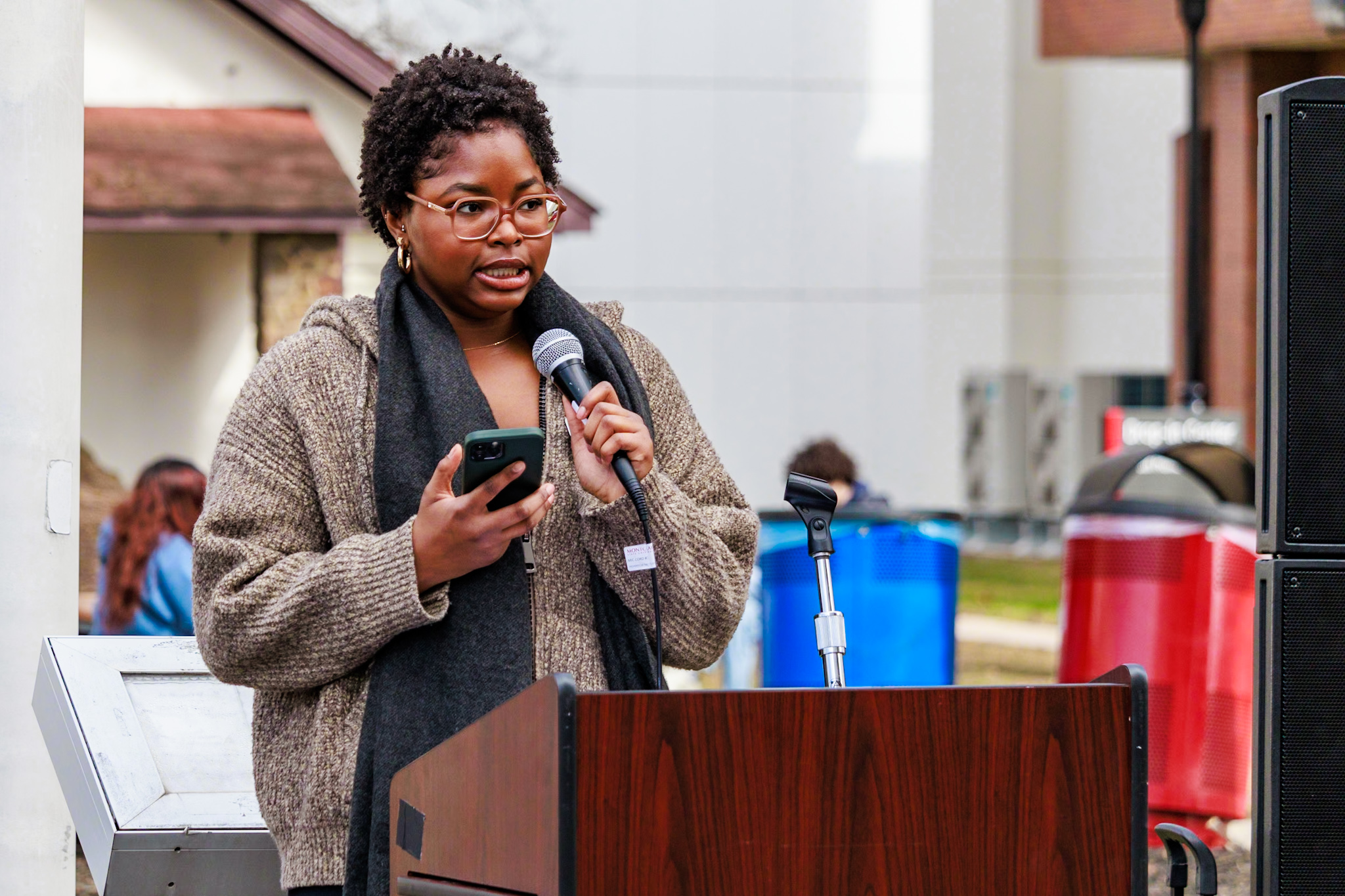 Celine Williams, the graduate coordinator for the Office for Social Justice and Diversity, gives a speech at the flag raising event. 
Sal DiMaggio | The Montclarion