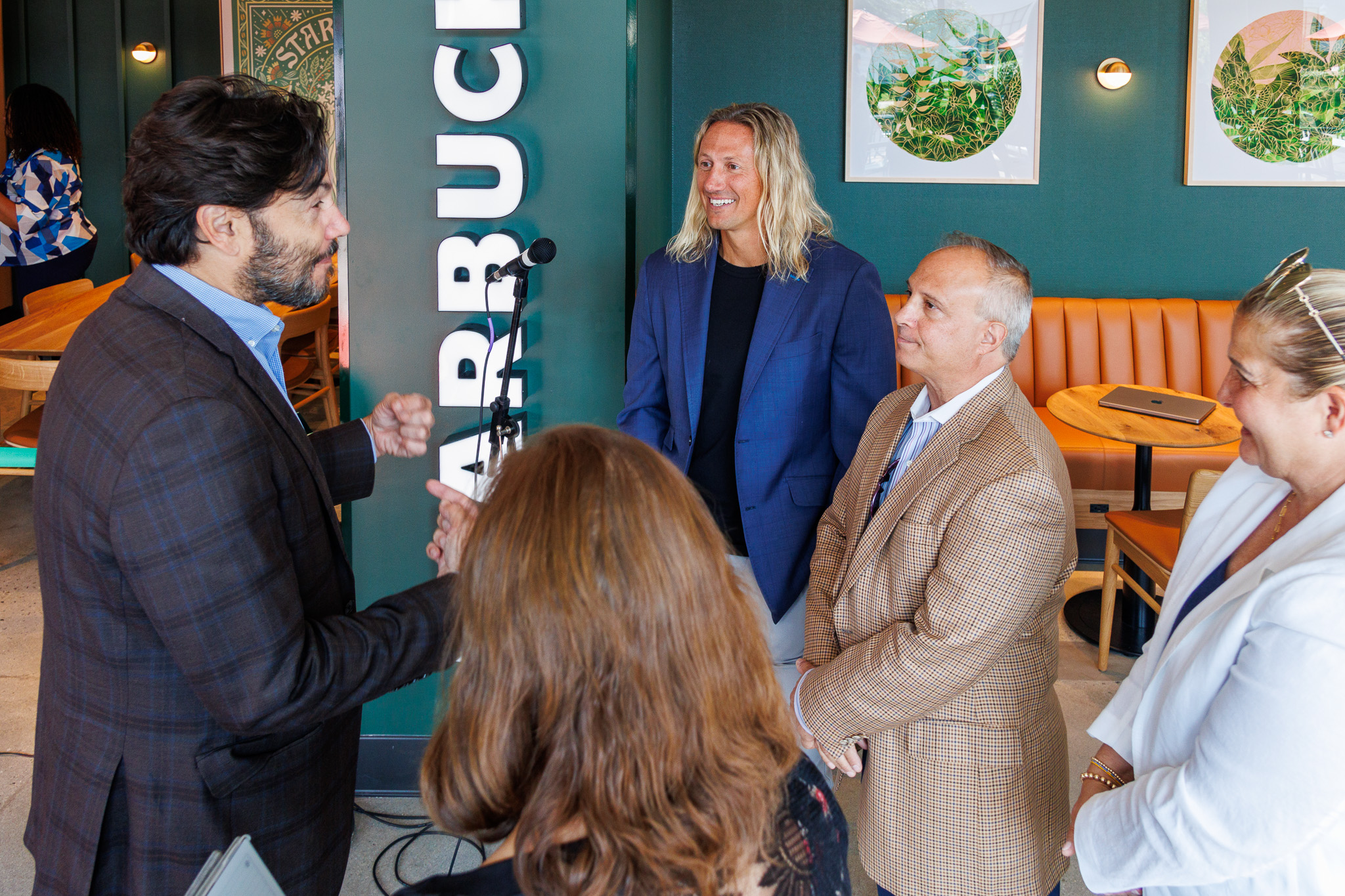 University president Jonathan Koppell greets director of dining services Brian Coonway and others in the new Starbucks.
Sal DiMaggio | The Montclarion