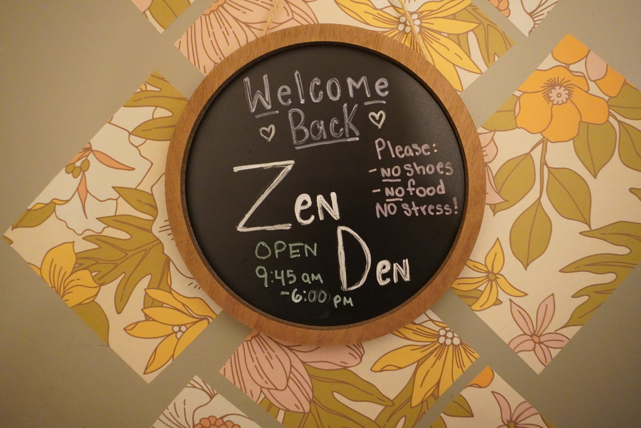 A sign welcomes students into the Zen Den. (The hours on the sign are inaccurate as the Den is open from 9 A.M. to 5 P.M.) Jordan Reed | The Montclarion