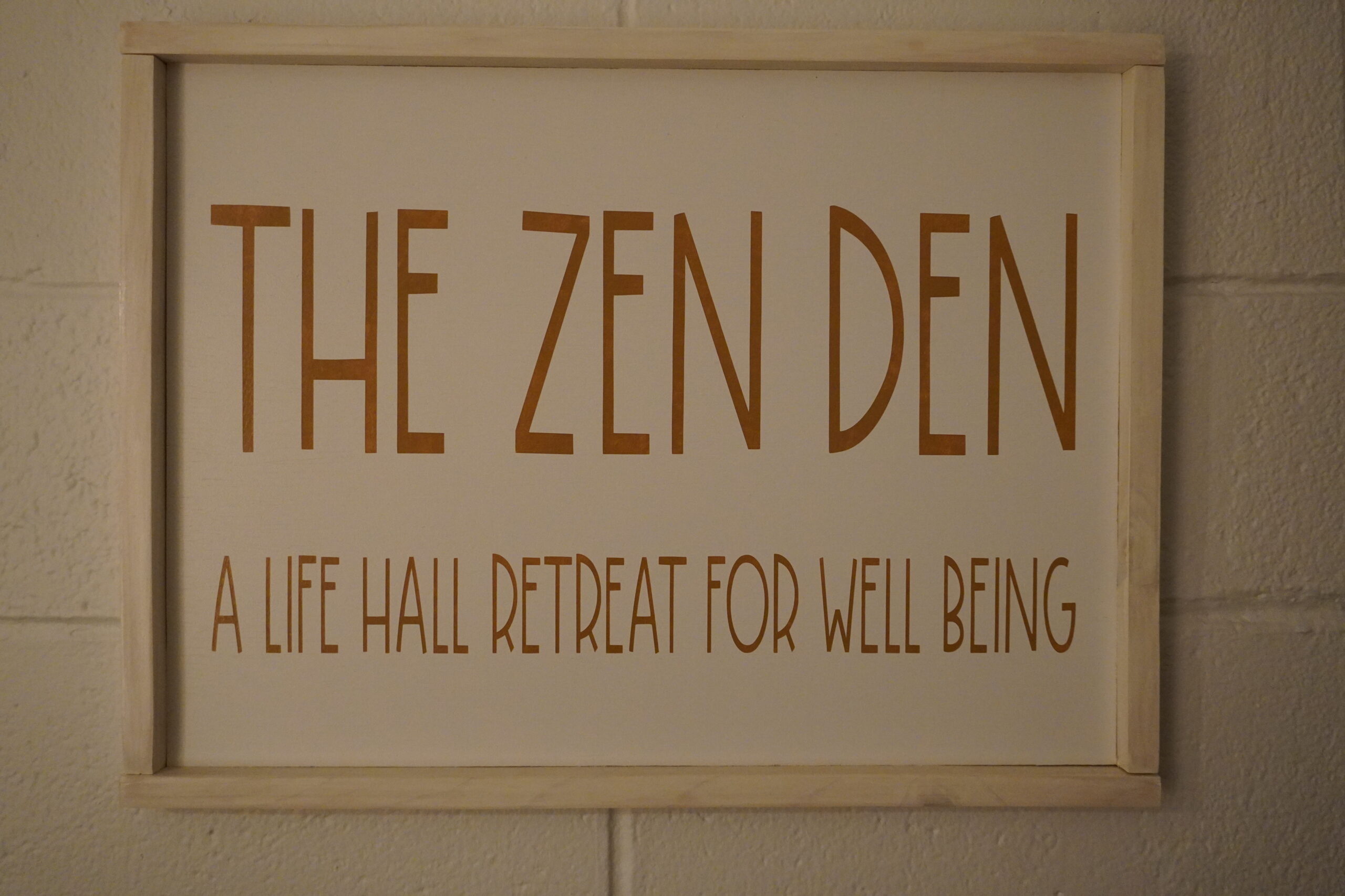 A sign outside of the office room's door welcomes students into the Zen Den. Jordan Reed | The Montclarion