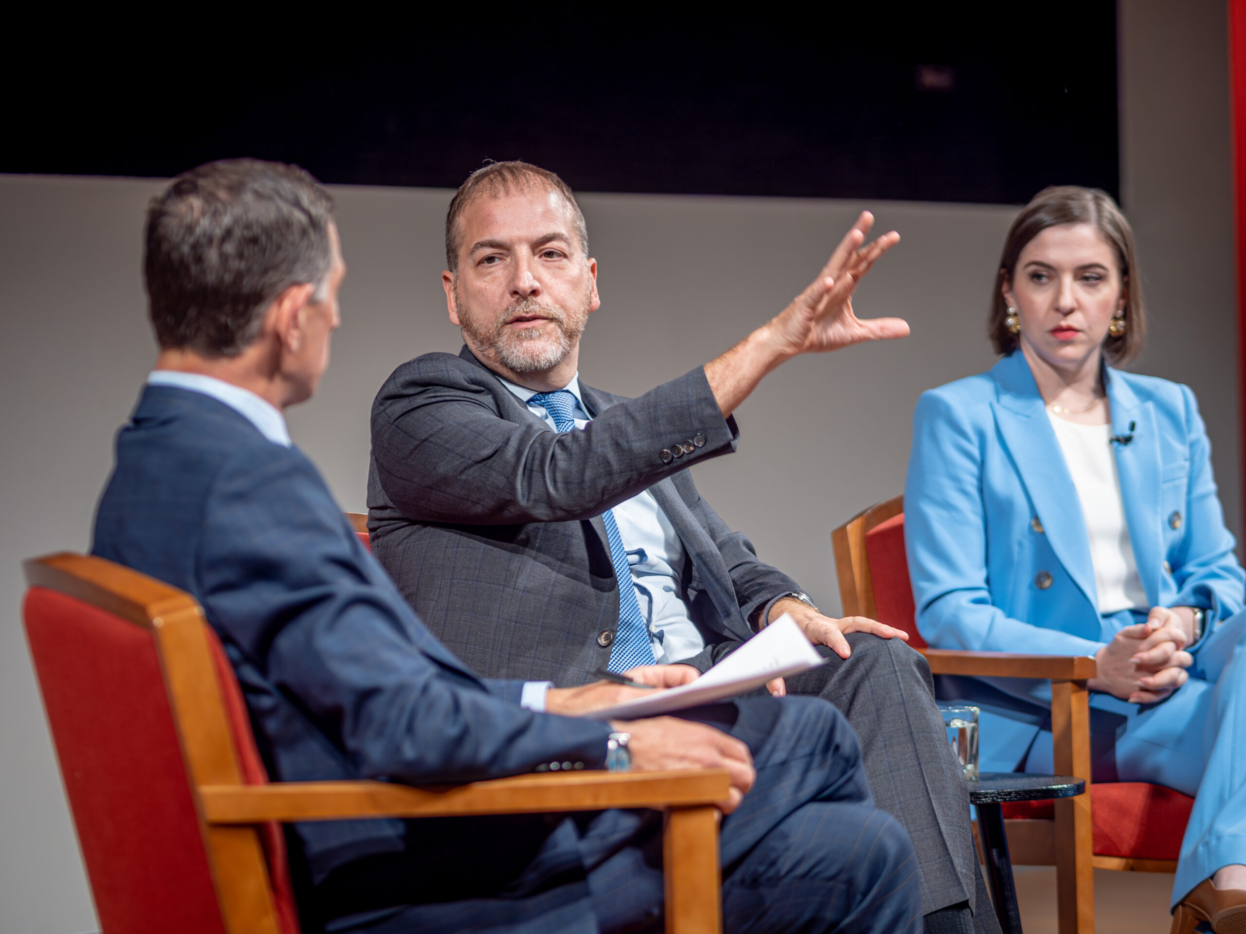 Chuck Todd discussing American democracy with his co-panelists.┃ Mike Peters