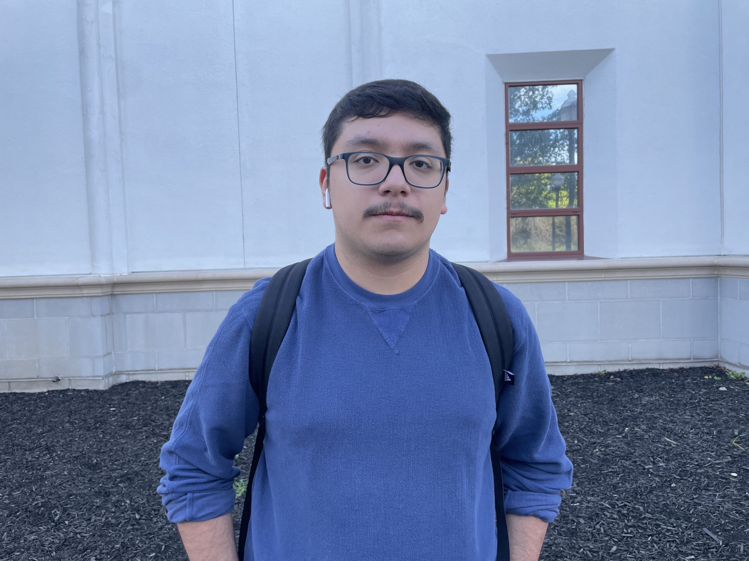 Jason Bonilla, a sophomore computer science major waiting outside University Hall