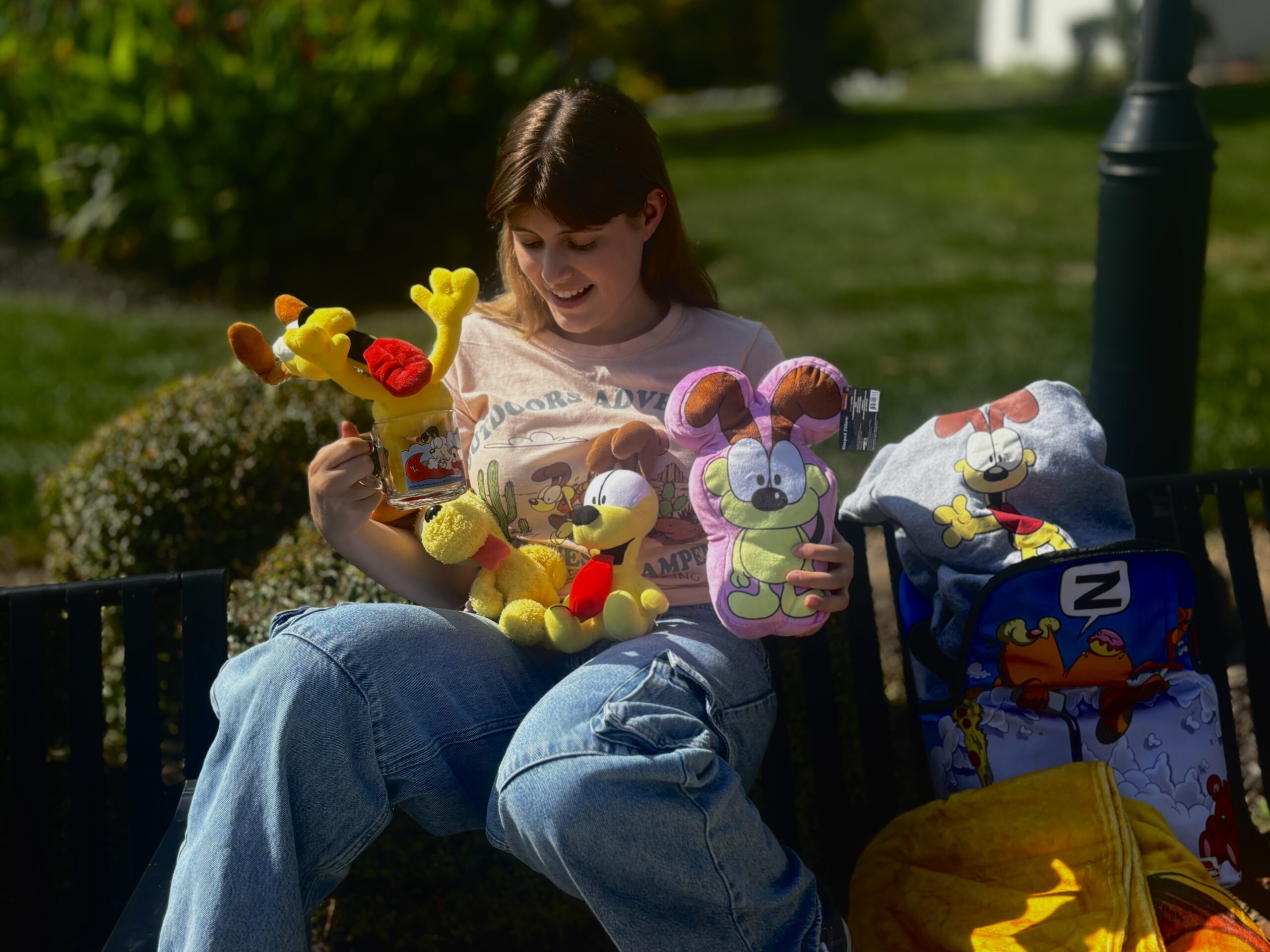 Senior Hannah Molitor poses with her mass amounts of Garfield and Odie merchandise