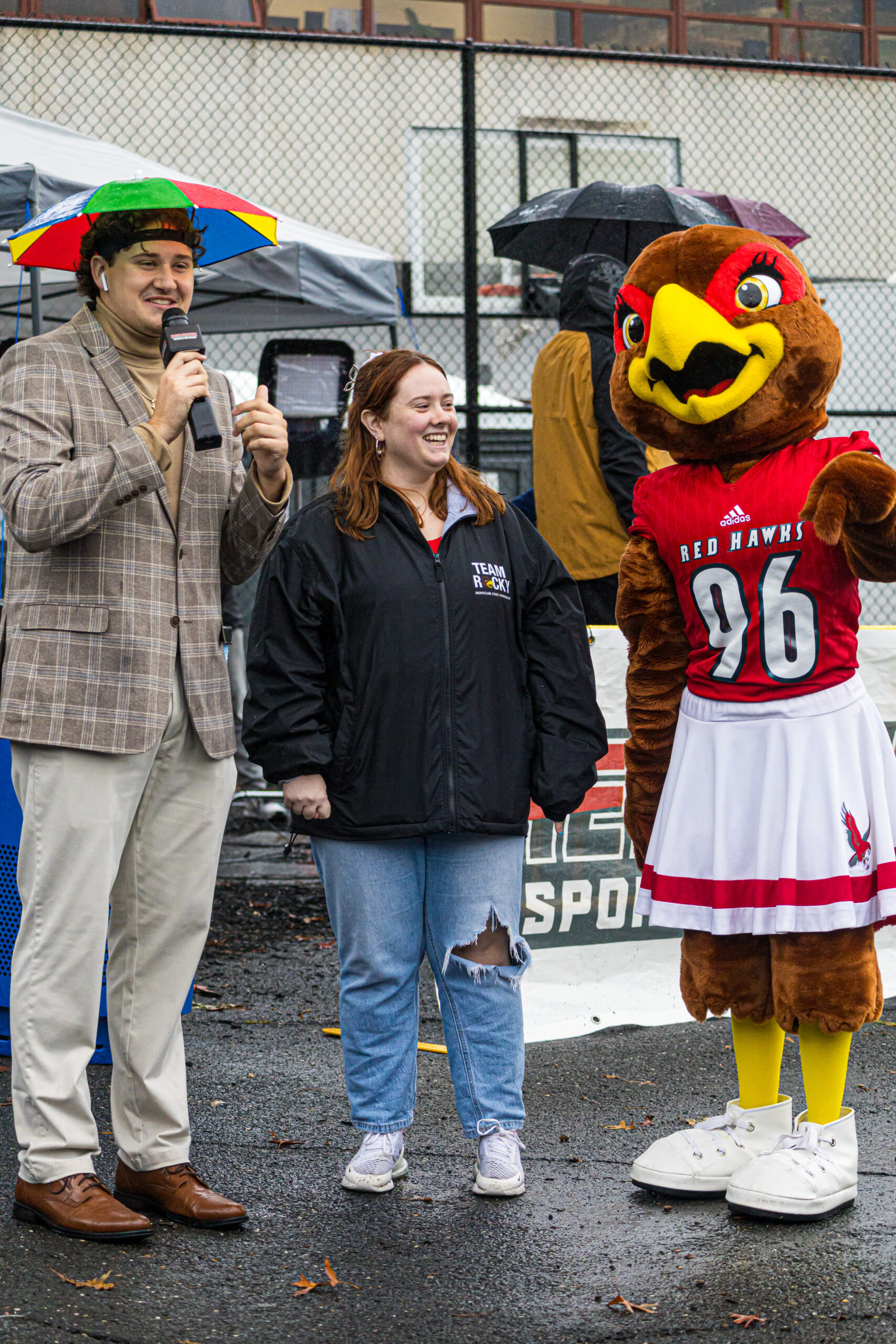 Students stand with Roxy, one of Montclair State's mascot's.
Qadir Branch | The Montclarion