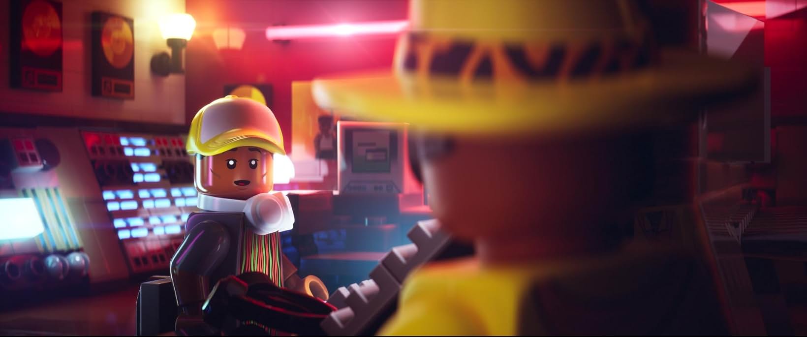 A Lego Pharrell speaking with a Lego N.O.R.E.