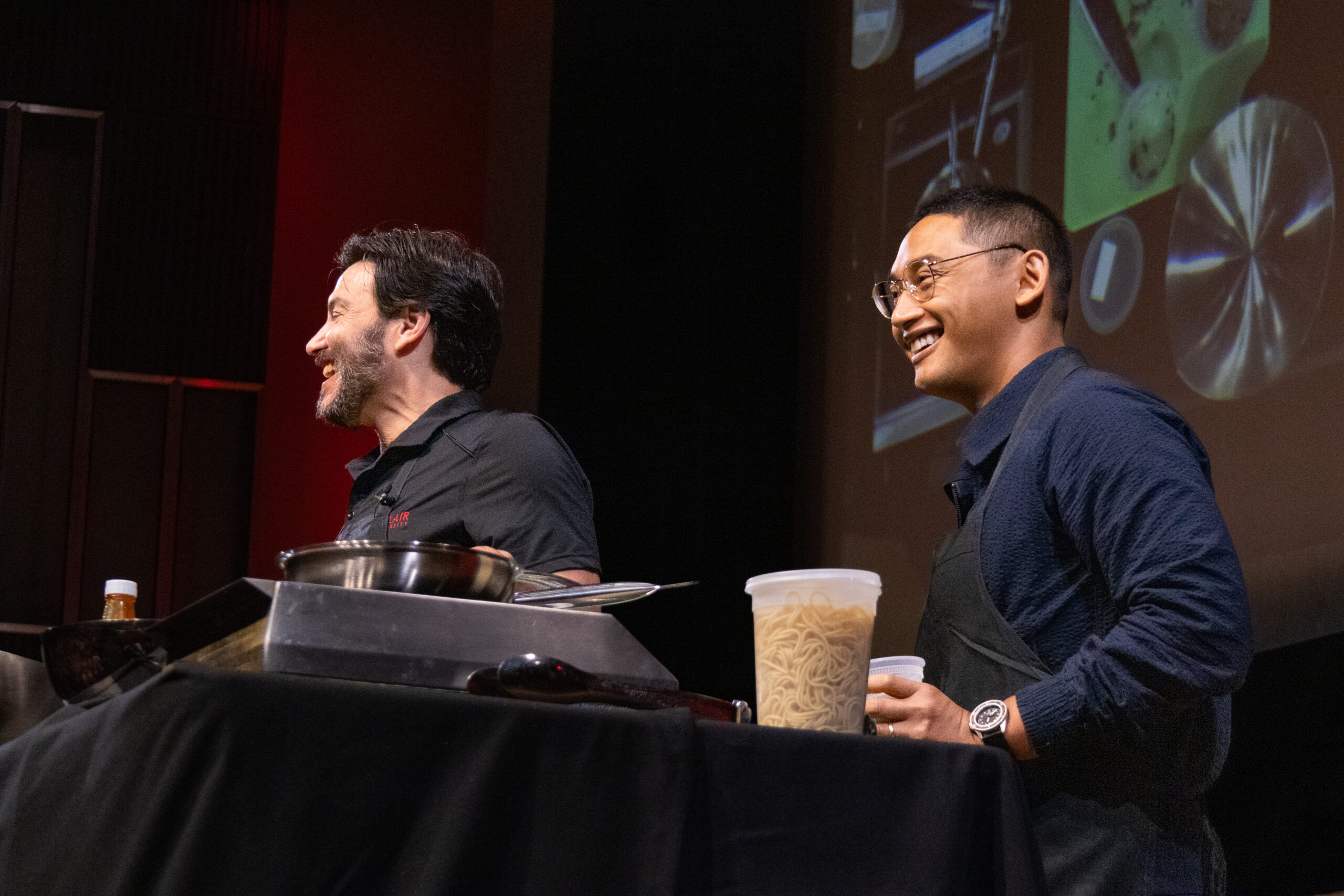 President Koppell and Montclair State University alumnus Josh Dela Cruz on stage for "Cooking with Koppell". Allen Macaraeg | The Montclarion