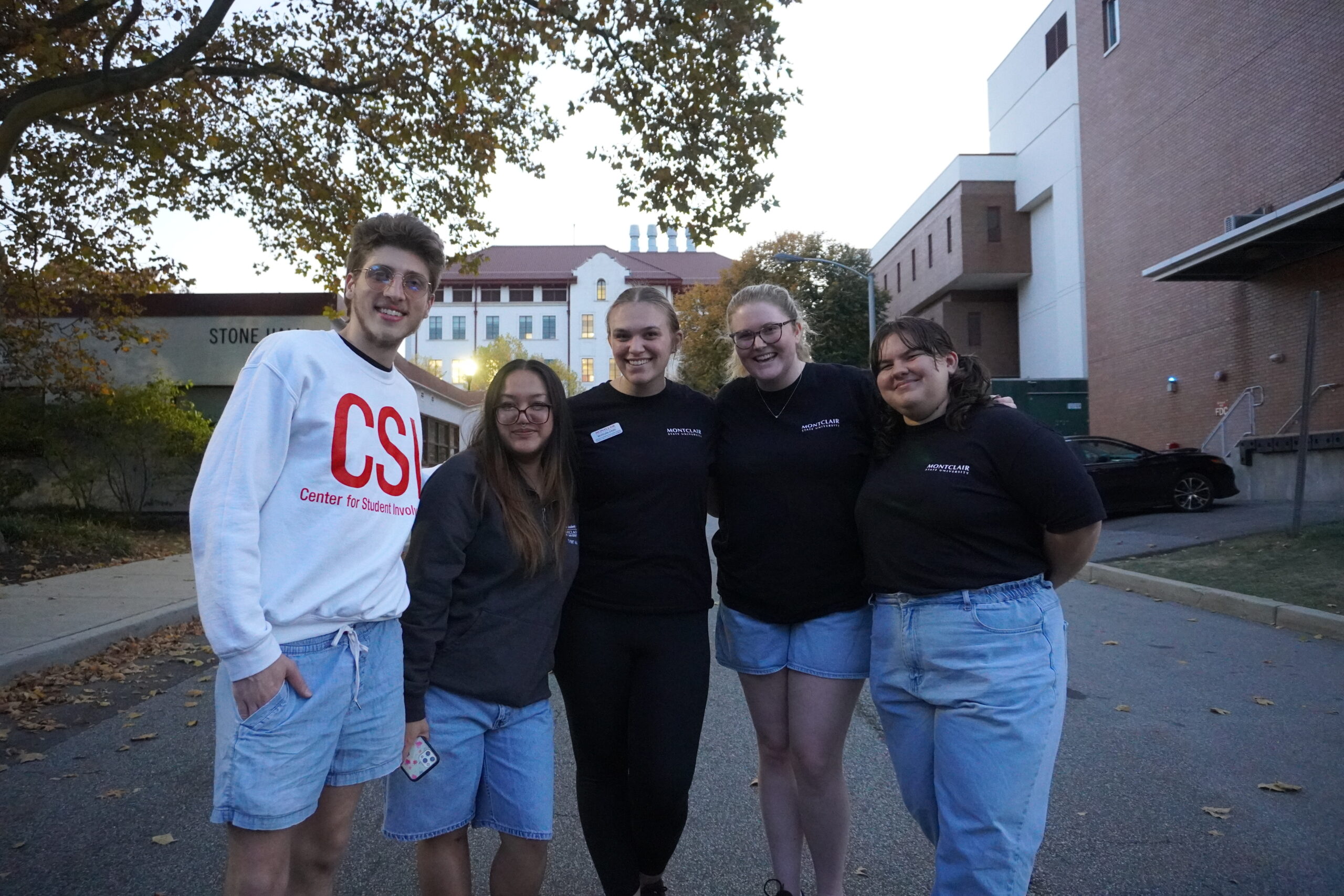 CSI volunteers for a photo before the grand opening on Nightmare on Stone Street. Jordan Reed | The Montclarion