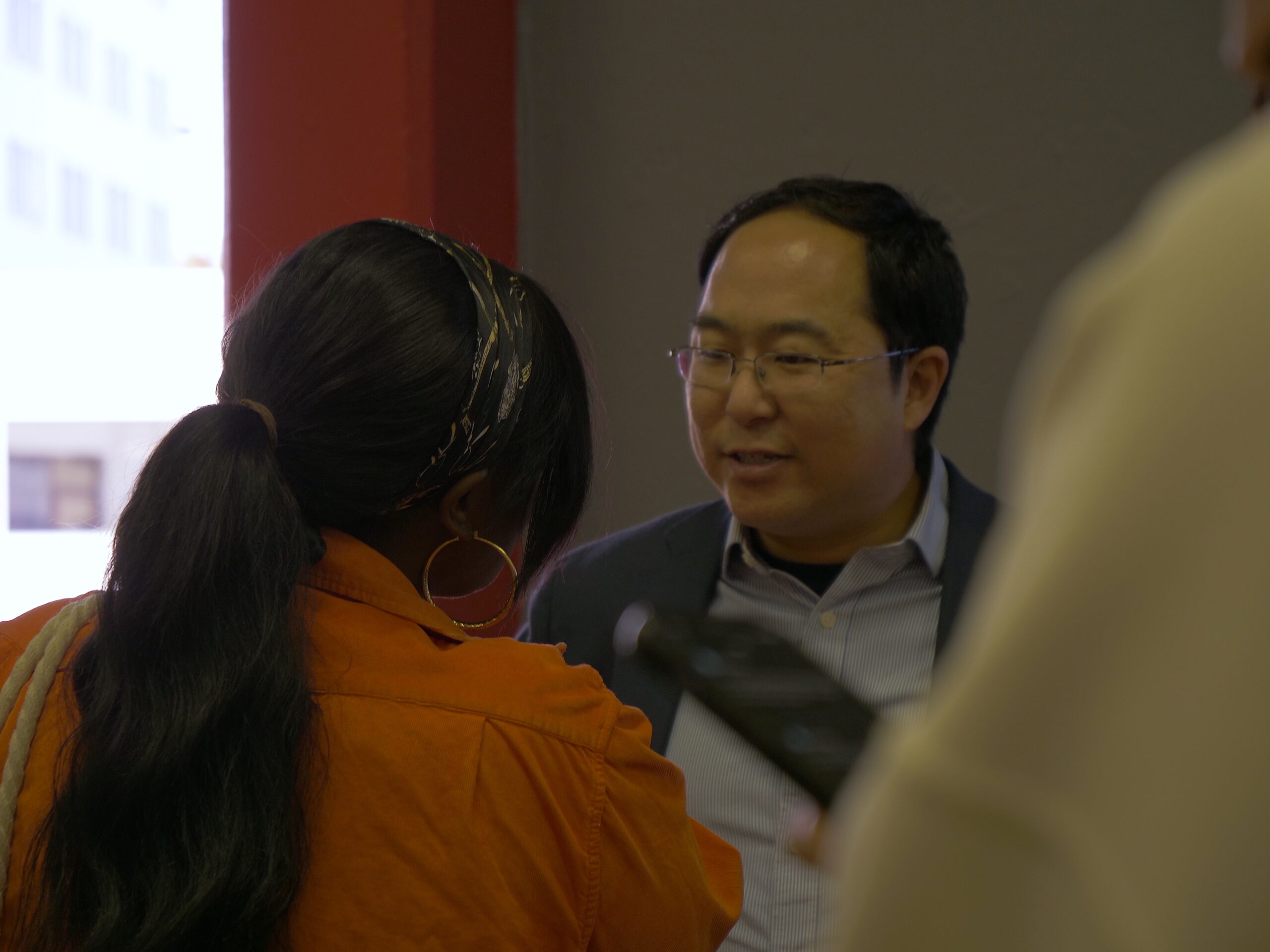 Congressman Andy Kim speaks to a supporter. Matt Lange | The Montclarion