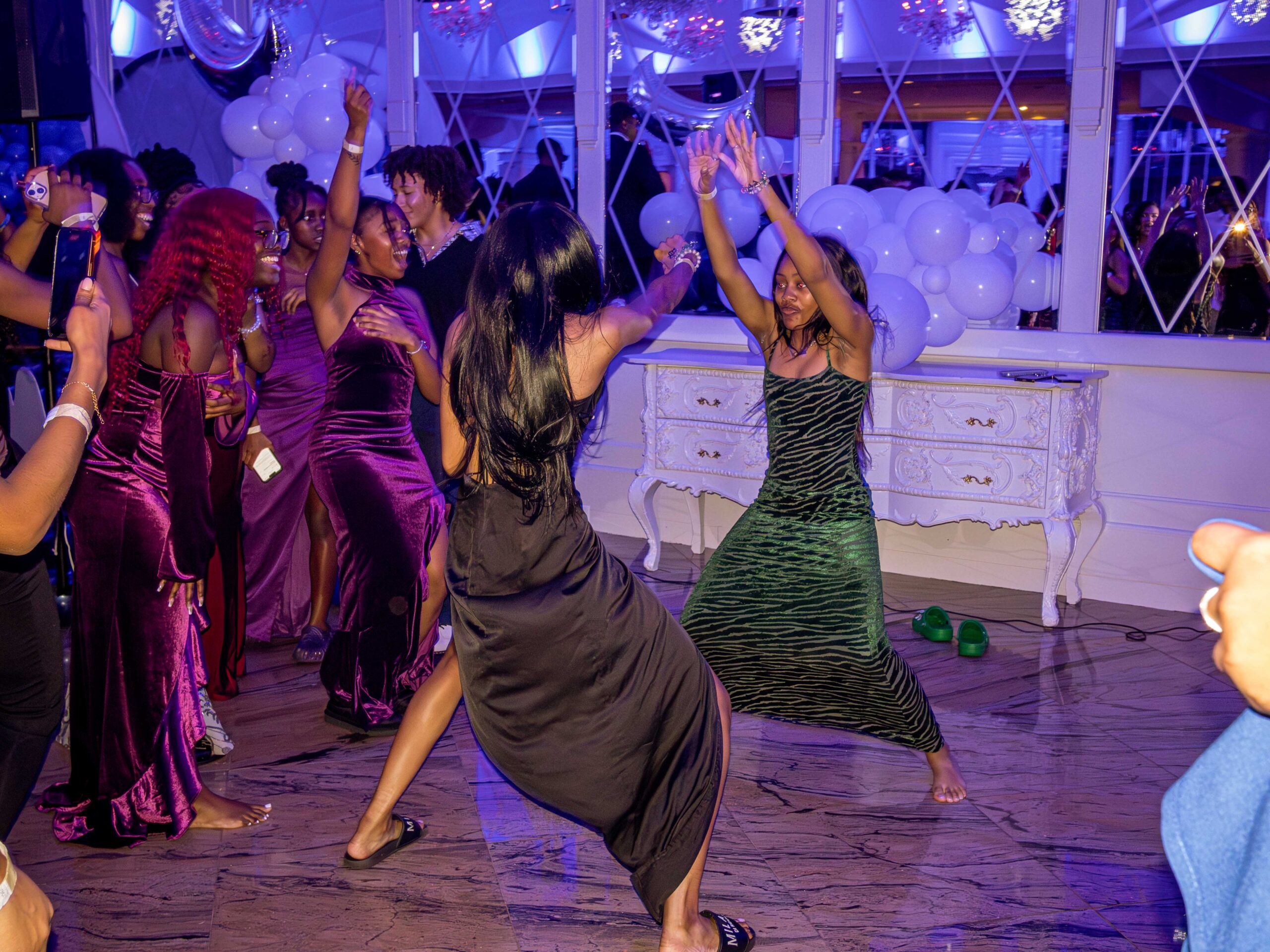 Two students dance with one another while on the dance floor at the 2024 SLAM Winter Gala on Thursday, November 21, 2024. Karsten Englander | The Montclarion