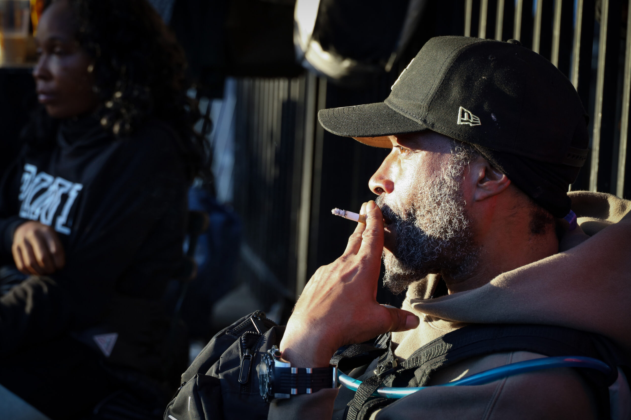 NEWARK, NJ, 10-21-2024. SMOKING CIGARRETTE IN PENN STATION CORNER : A man smokes cigarrette in the corner of Penn Station, in Newark. Near the train station, drug users haven been previously seen and identified by the law enforncement. Adarlin Batista | The Montclarion