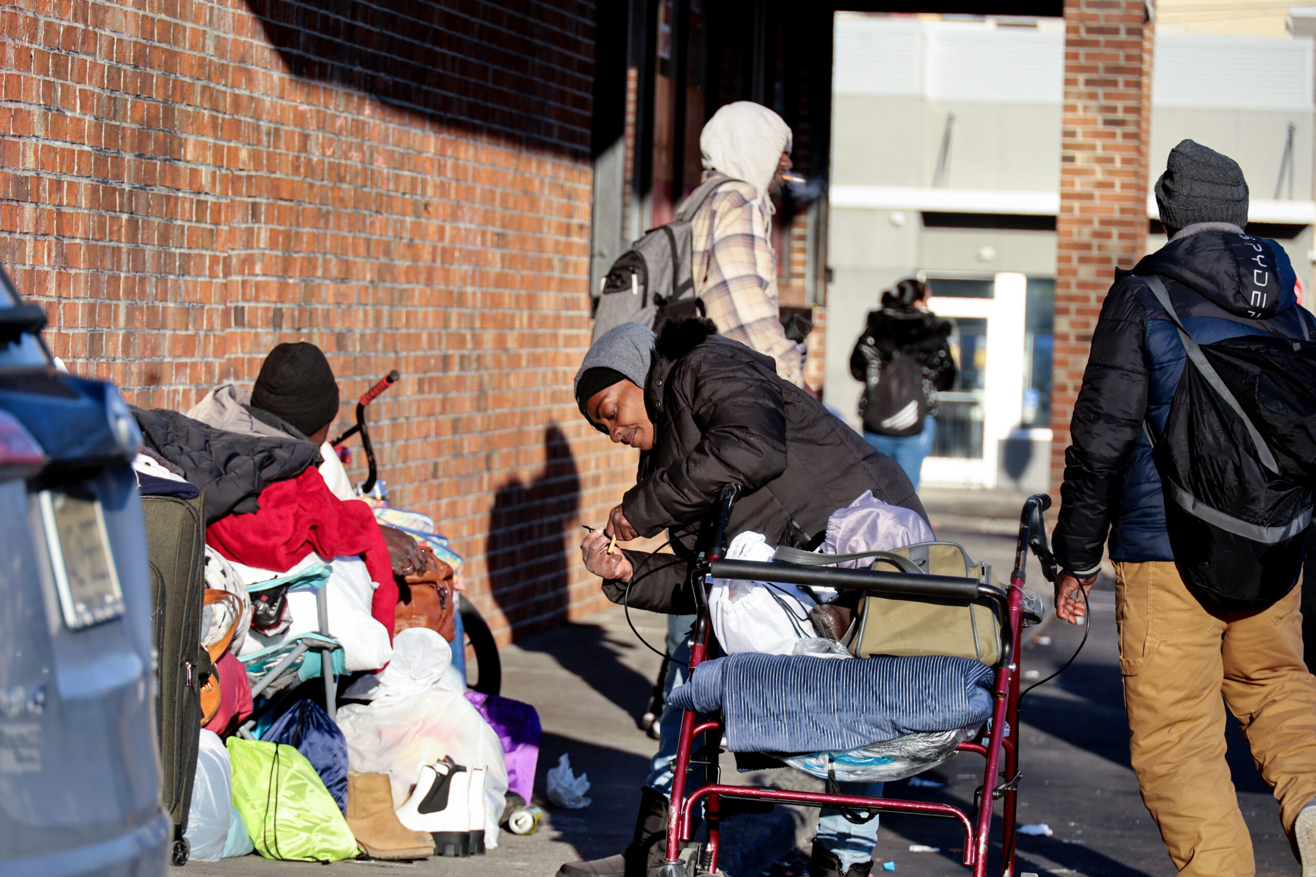 NEWARK, NJ, 12-14-2024. SUSPECTED SUBTANCES USE IN PUBLIC SPACES: Individuals use susbtances outside a plaza in Clinton Avenues, a commercial area with some businesses like fast-food restaurant, such as McDonalds, liquor store, laundry, near a bus stop and in front of a supermarket. Some other people have been previosly seen and identified by law enforcement, in this near. Adarlin Batista | The Montclarion