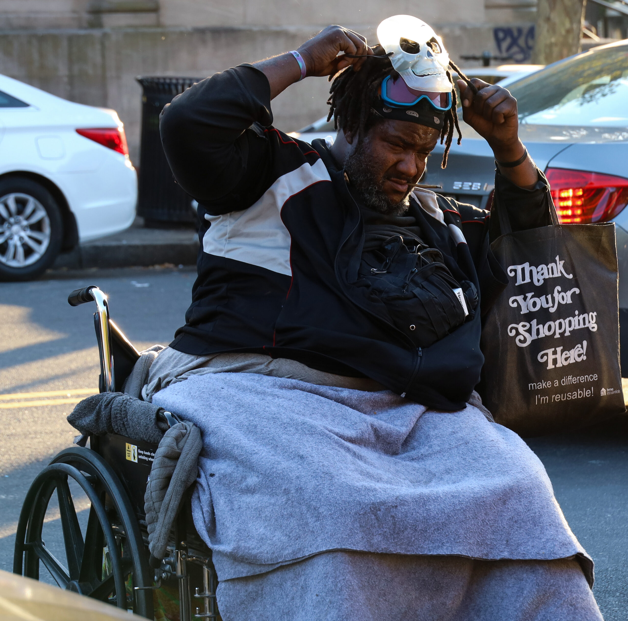 NEWARK, NJ, 10-21-2024. VISIBLE DRUG USERS: A drug user named "Eugine" consumes substances in public while sitting in a wheelchair near of Penn Station in Newark, some of the effects of which have left him with physical issues. Adarlin Batista | The Montclarion