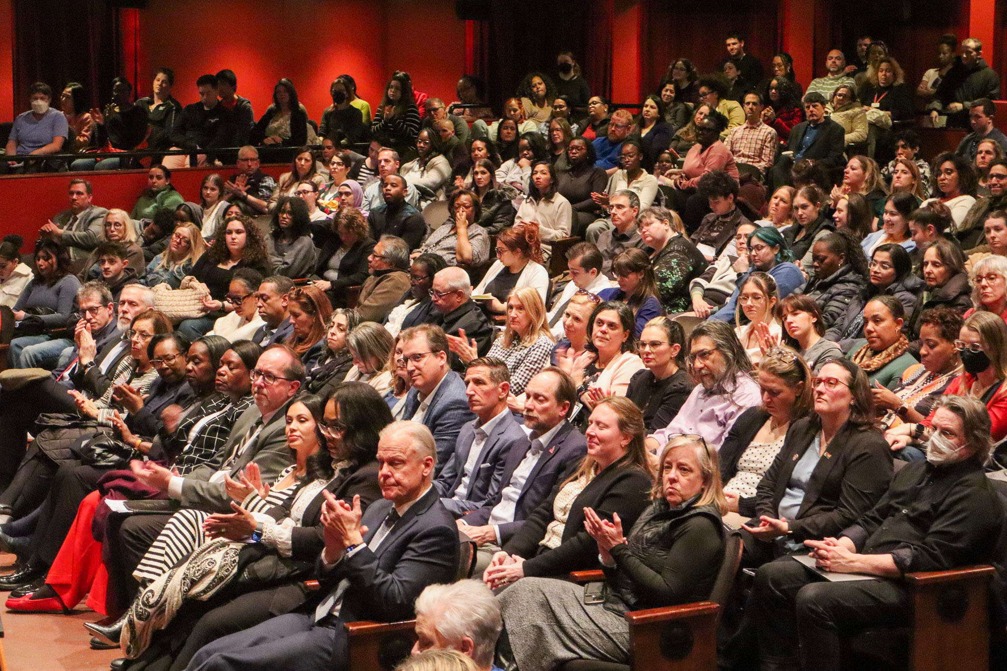 The crowd at the Town Hall clapping in unison during President Koppell's speech. David Bien-Aime The Montclarion