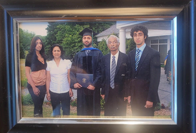 Photograph of Amy Ahmad’s family including her husband and three children. Photo courtesy of Amy Ahmad