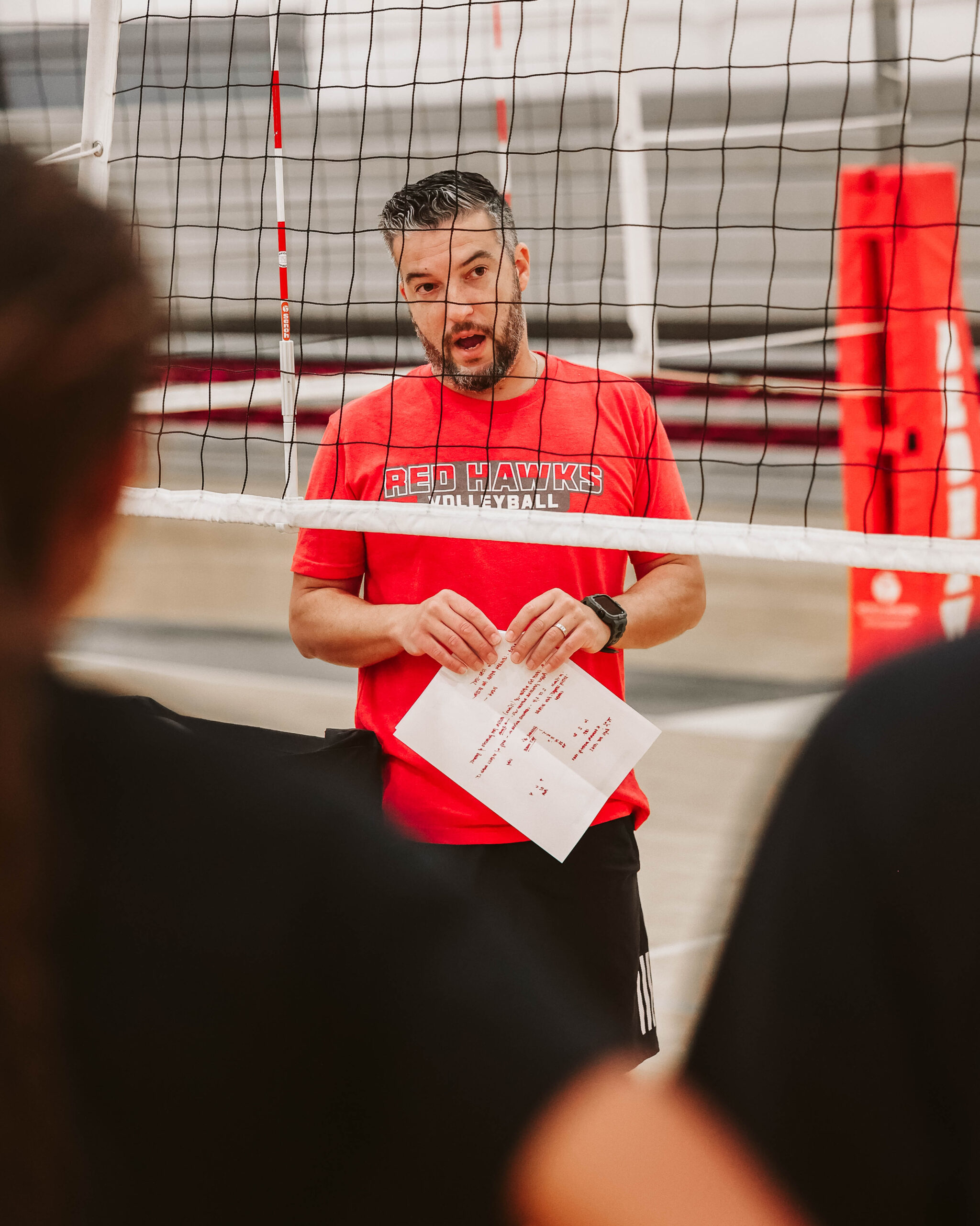 Head Coach Eduardo Stawinski addresses the team during practice.