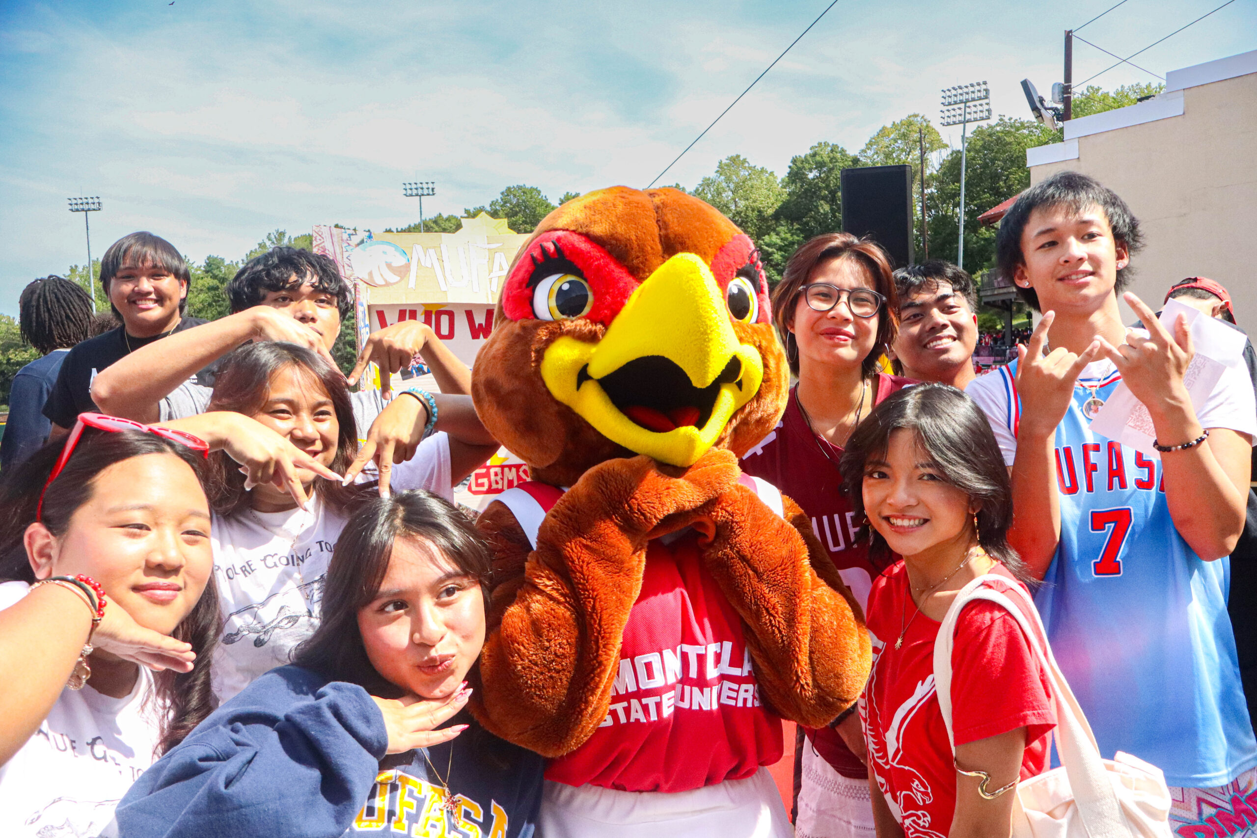 Mufasa Club group photo with Roxy during the student organization fair. David Bien-Aime︱The Montclarion