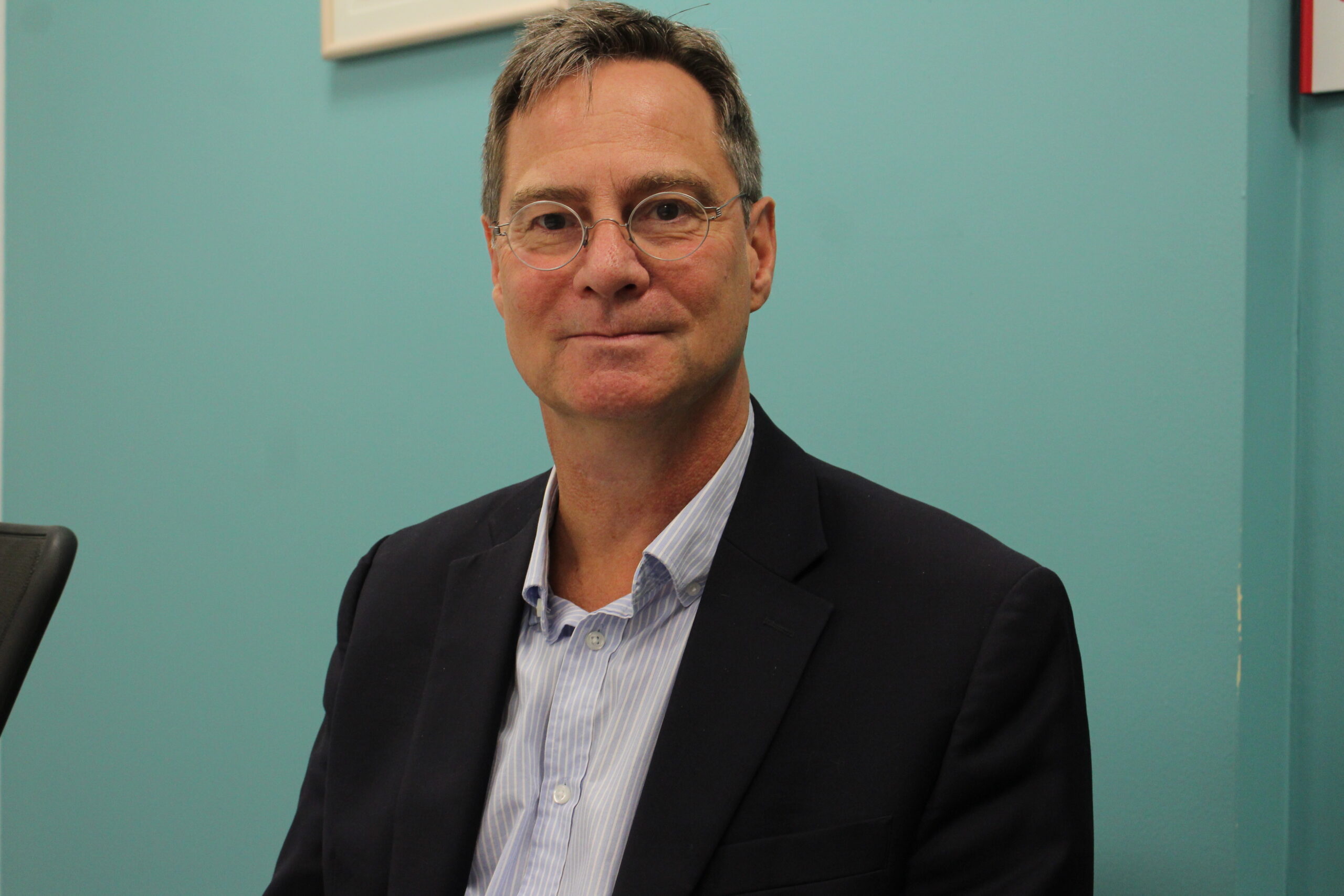 Dr. Todd Kelshaw, the  Associate Dean for Faculty and Academic Affairs in the College of Communication and Media, poses for the camera