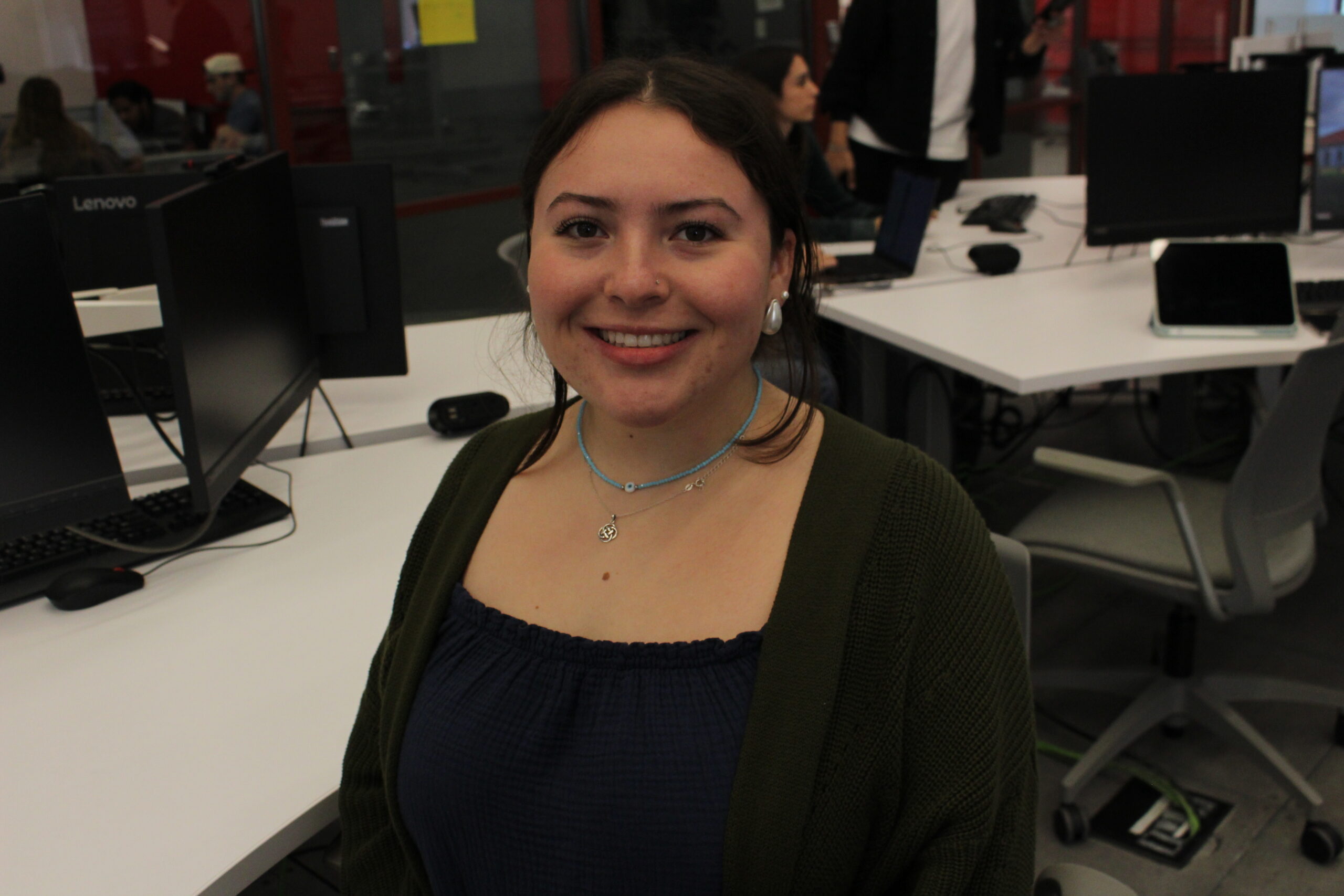 Senior public relations student Olivia Doe poses for the camera