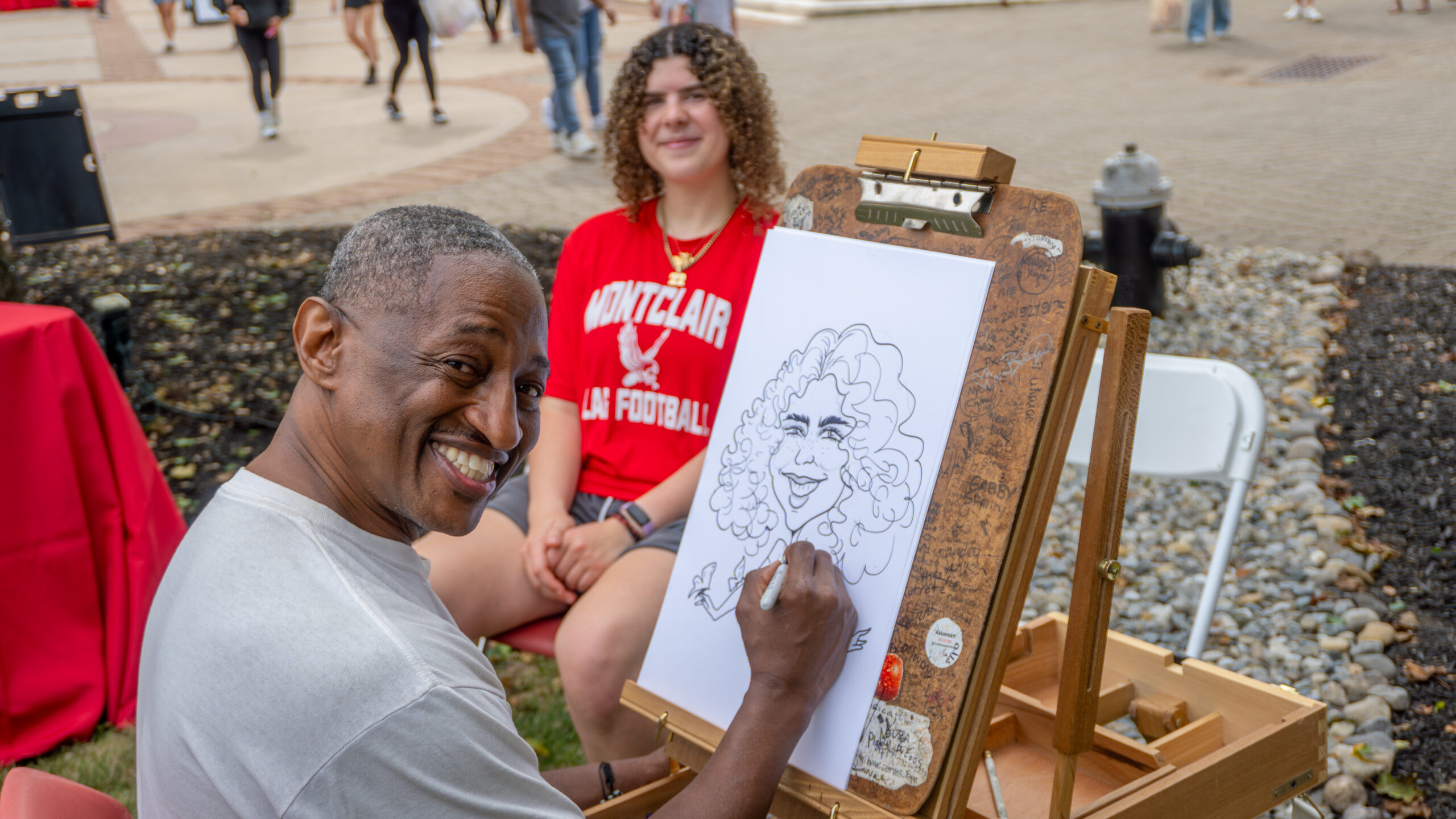 Caricature Artist steals the show at Homecoming.