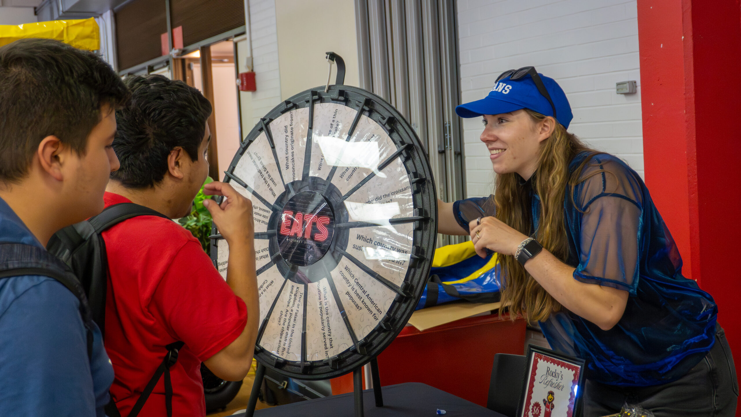 Montclair Eats plays a trivia game with students for a prize.