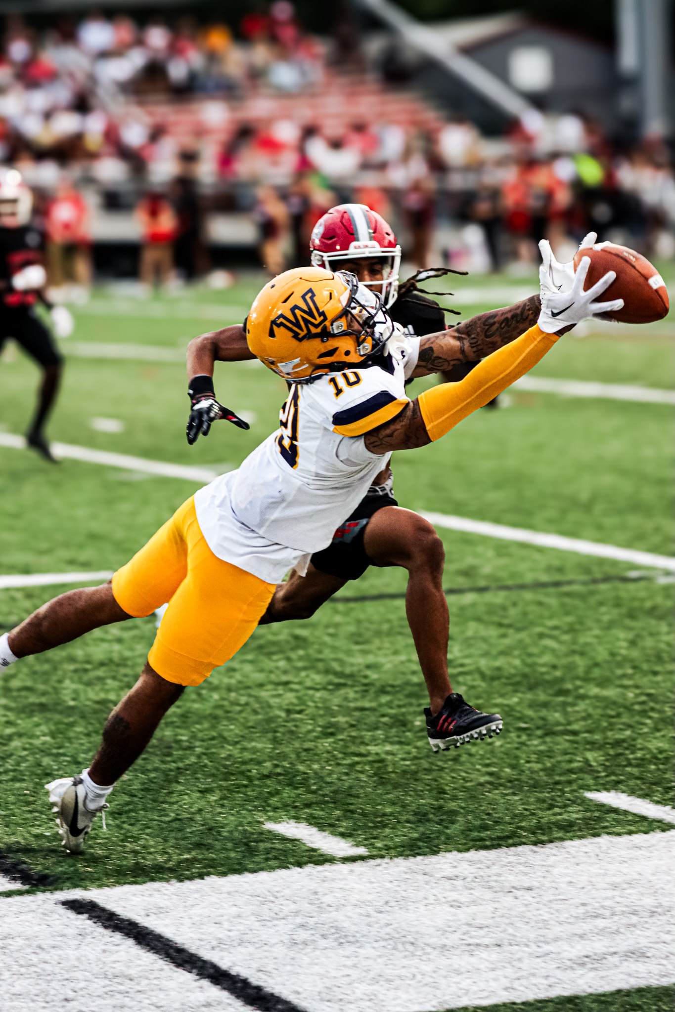 Wilkes receiver Rahmel Terry tries to reel in a pass versus Montclair State on Sept. 27.