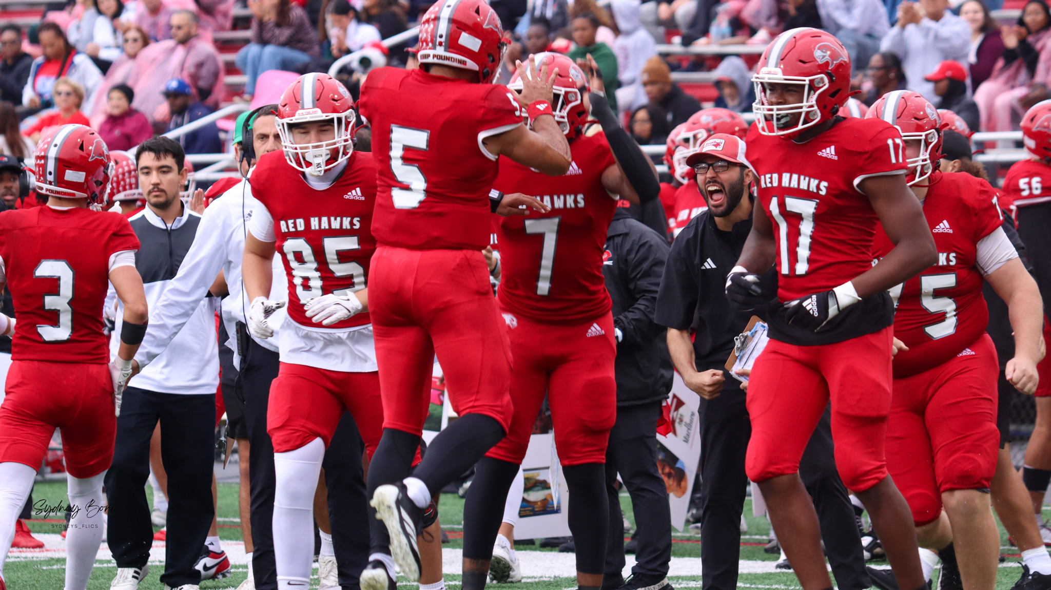 Montclair State quarterback Luke Henrich (5) and running back Diante Wilson (7) celebrate during the 2025 Breakfast Bowl versus Rowan.