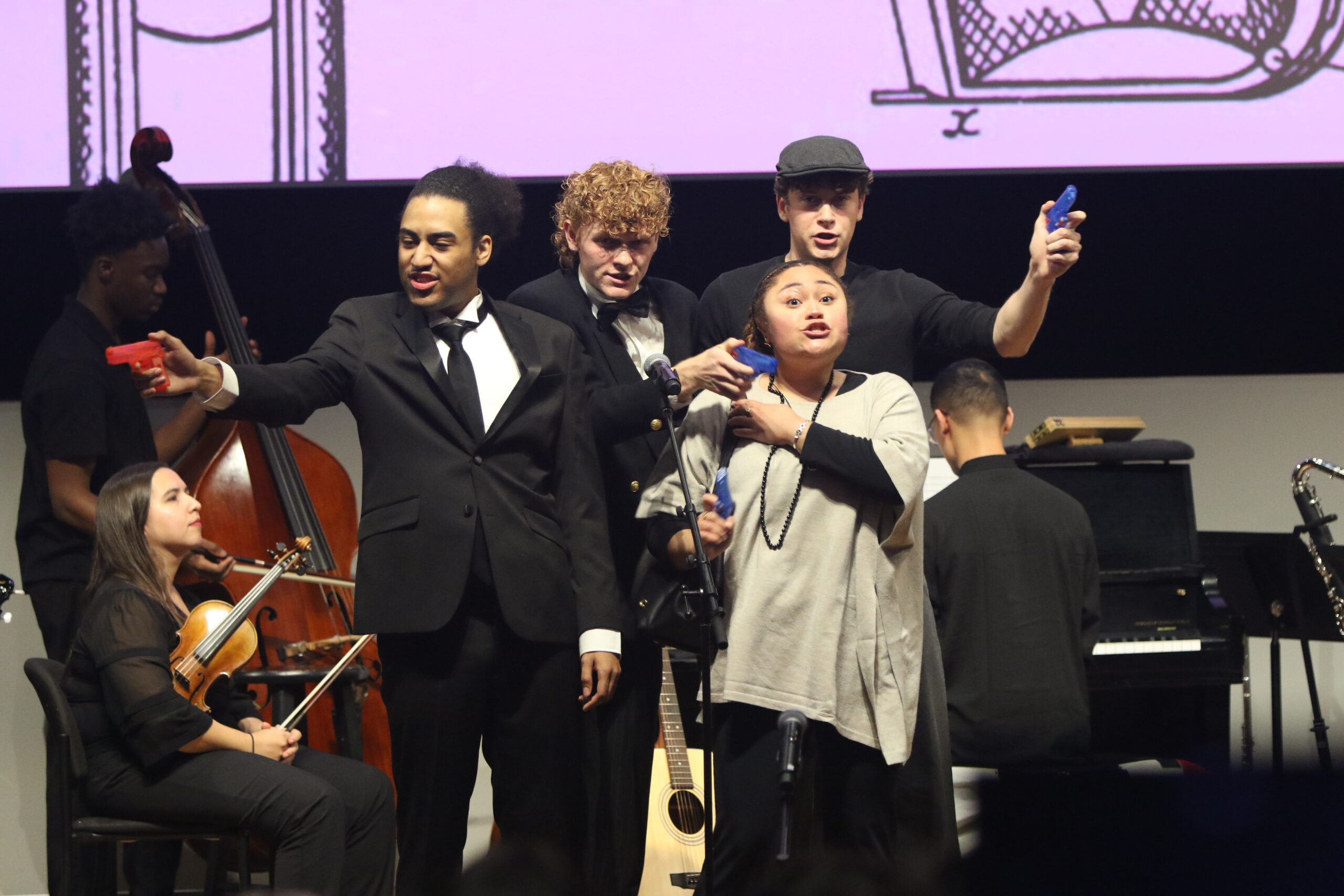 Diogo Ramirez as John Wilkes Booth, Jack Gemmell as Charles Guiteau, Genesis Harper as Sara Jane Moore and Jack Palowski as Leon Czolgosz performing The Gun Song
Mandi Dellagicoma l The Montclarion