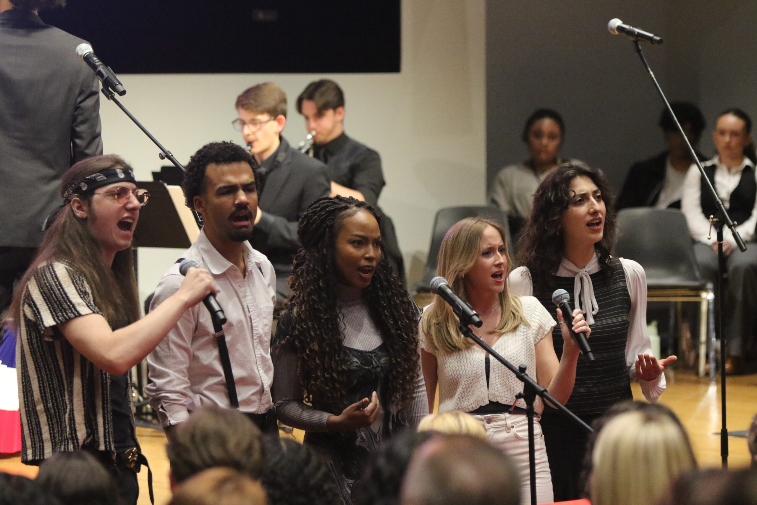 (Left to Right) Marigold Melcher, Zayne Thomie, Princess Gant, Lussi Pearl, and Mia Grizzutti perform as The Balladeers