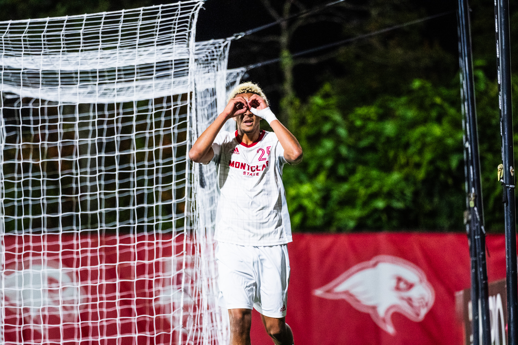Freshman forward Tomas Monteiro celebrates after a goal against DeSales University on Oct. 8