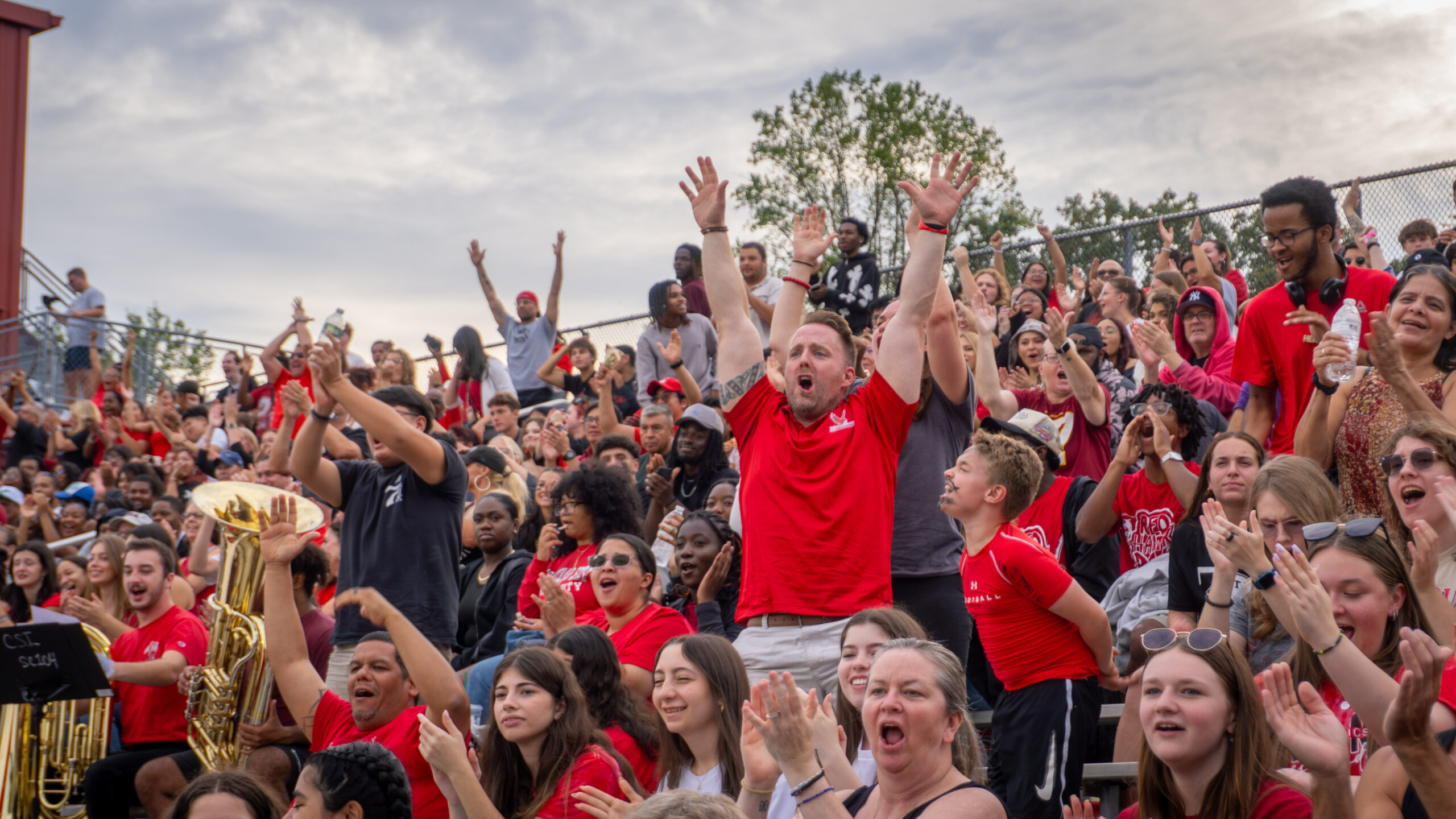 The crowd cheers as the Montclair State University Football teams get a first down. Sophia Lazaridis