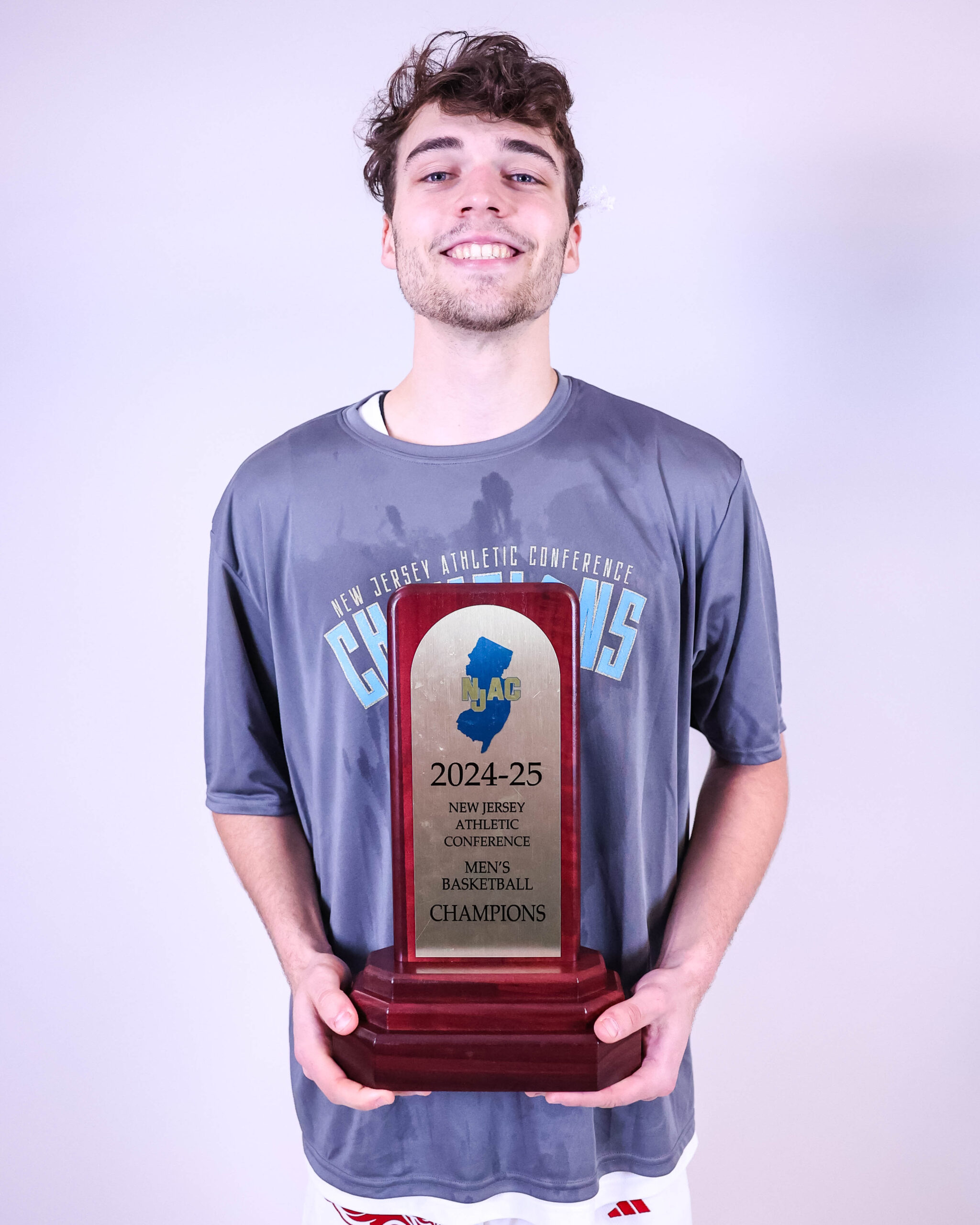 The Montclair State men's basketball team claimed their first NJAC trophy since 2003 last winter, in part due to the contributions of transfer Jacob Morales. Photo courtesy of Montclair State Athletics