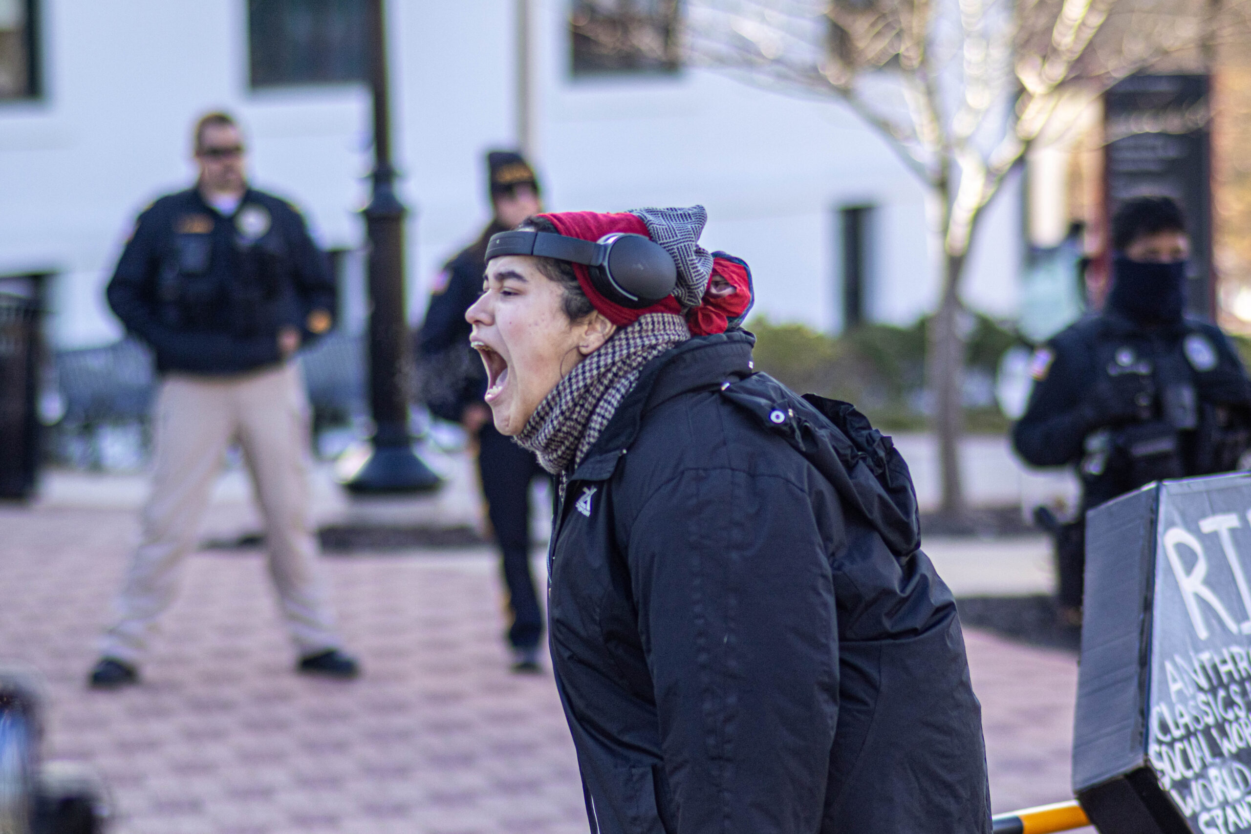 During the protest against the restructuring of the College of Humanities and Social Sciences, the creator of the petition, Jazmine Perez outside Cole Hall condemning the university's restructuring plan.