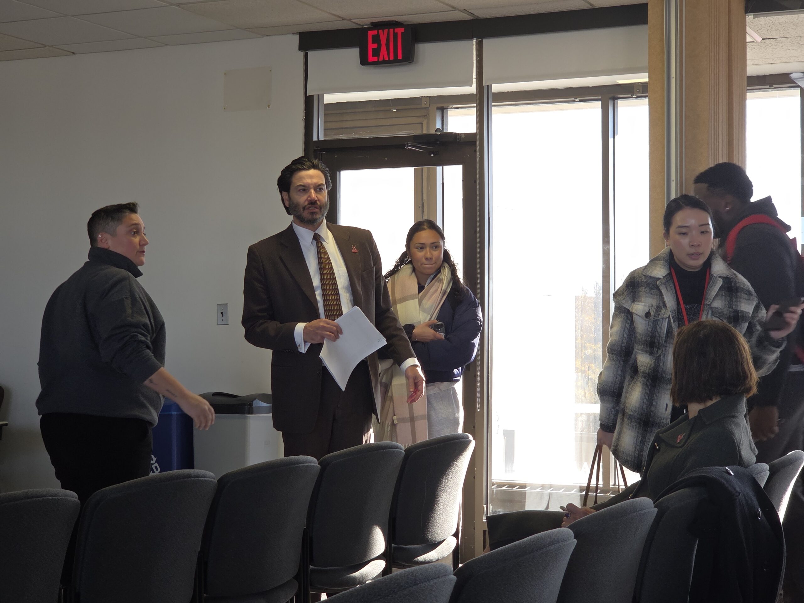 Dr. Jonathan Koppell, university president, arrives for the Dec 3 town hall meeting in Student Center Room 411 held in front of the Student Government Association.