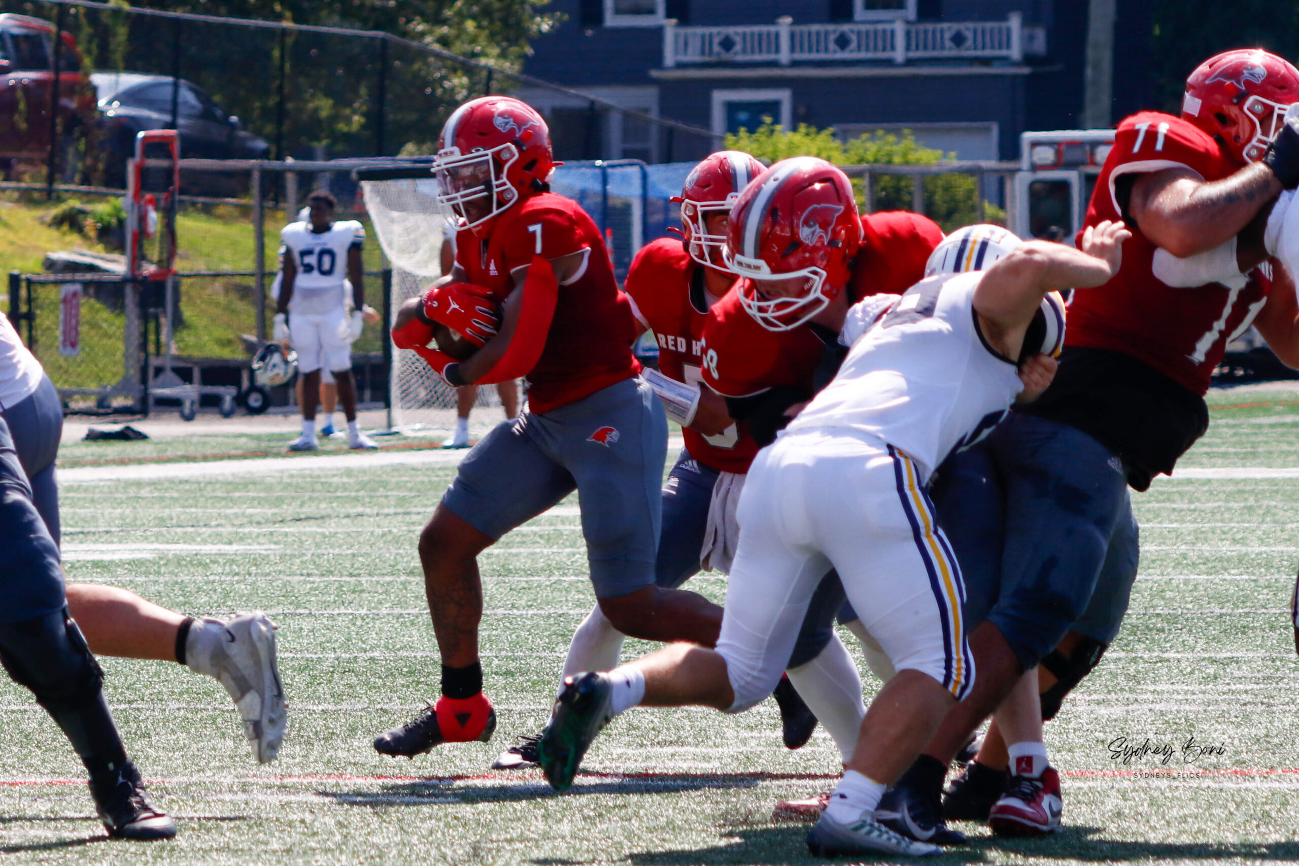 Montclair football #7 with the ball, rushing to get a to get a touchdown. Montclair State rushed for 285 yards vs Lycoming, their most in a game since 2023. Syd Boni | The Montclarion