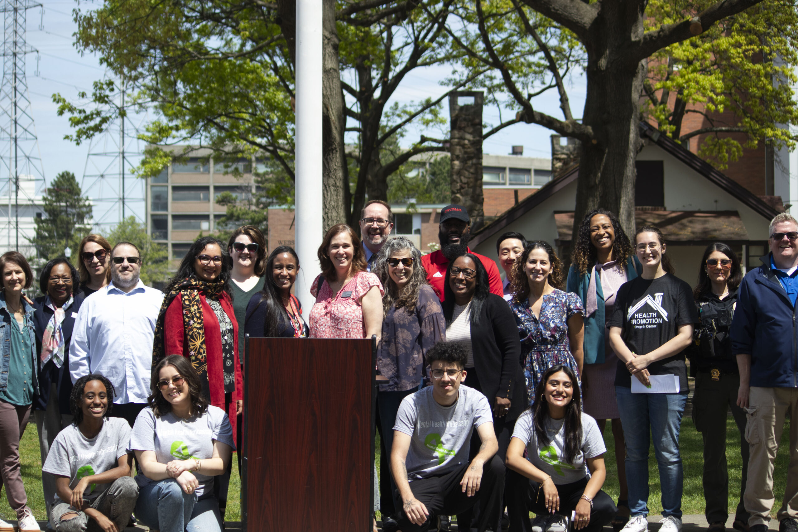 Montclair State University students and faculty at Mental Health Awareness Month flag raising ceremony. Emily Ramirez