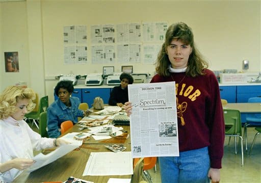 Tammy Hawkins, editor of The Spectrum high school newspaper, holds a copy of the paper in 1988. The Supreme Court ruled against their freedom of speech. AP Photo/James A. Finley