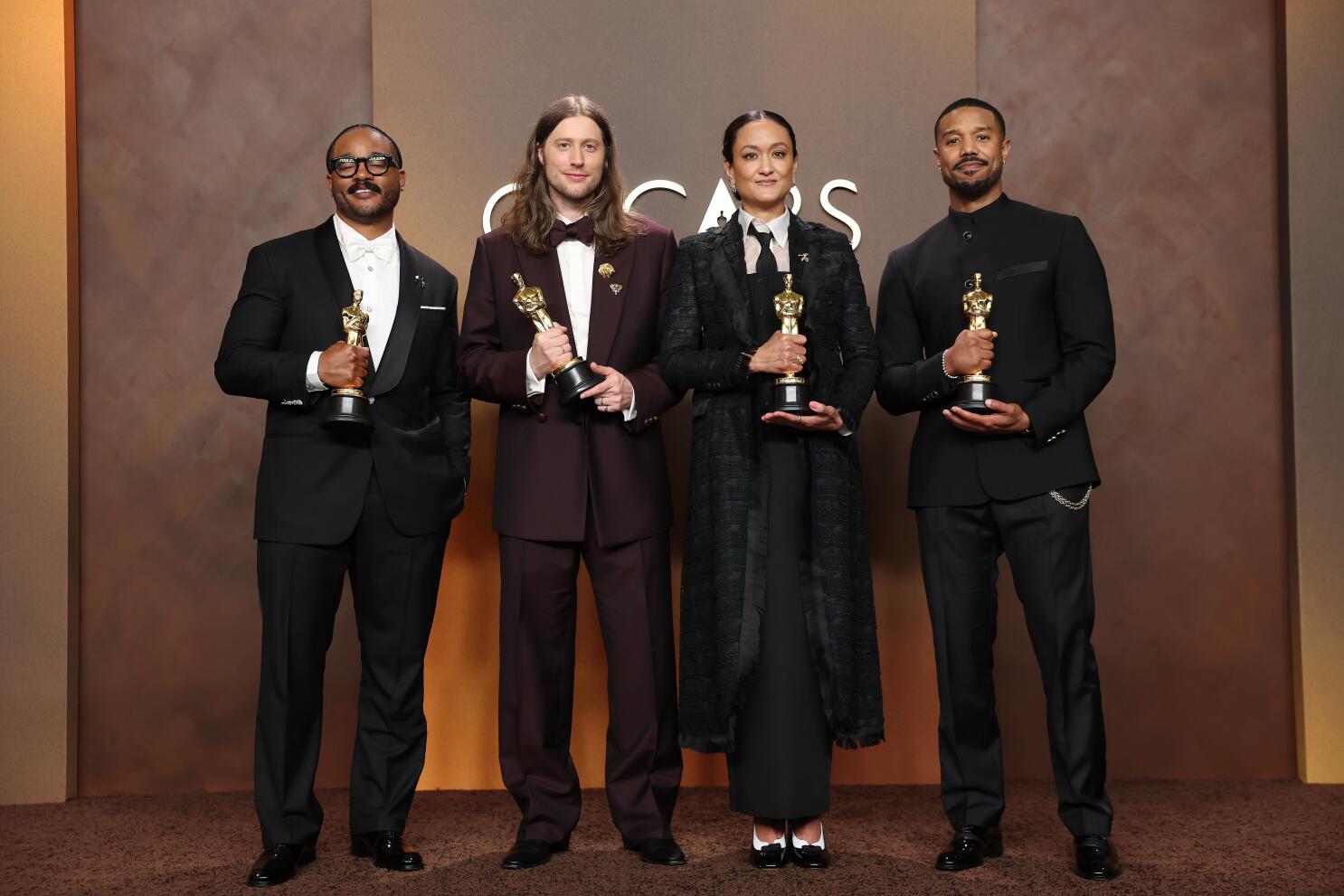 Hollywood, CA - March 15, 2026: Hollywood, CA - March 15, 2026: Ryan Coogler holds his Oscar for Best Original Screenplay, Ludwig Goransson with his Oscar for Best Original Score, Autumn Durald Arkapaw with her Oscar for Cinematography anf Michael B. Jordan with his Oscar for Actor in a Leading Role, all for "Sinners" during the 98th Annual Academy Awards held by the Academy of Motion Picture Arts and Sciences at the Dolby Theatre in Hollywood, CA, Sunday, March 15, 2026. (Kayla Bartkowski / Los Angeles Times)