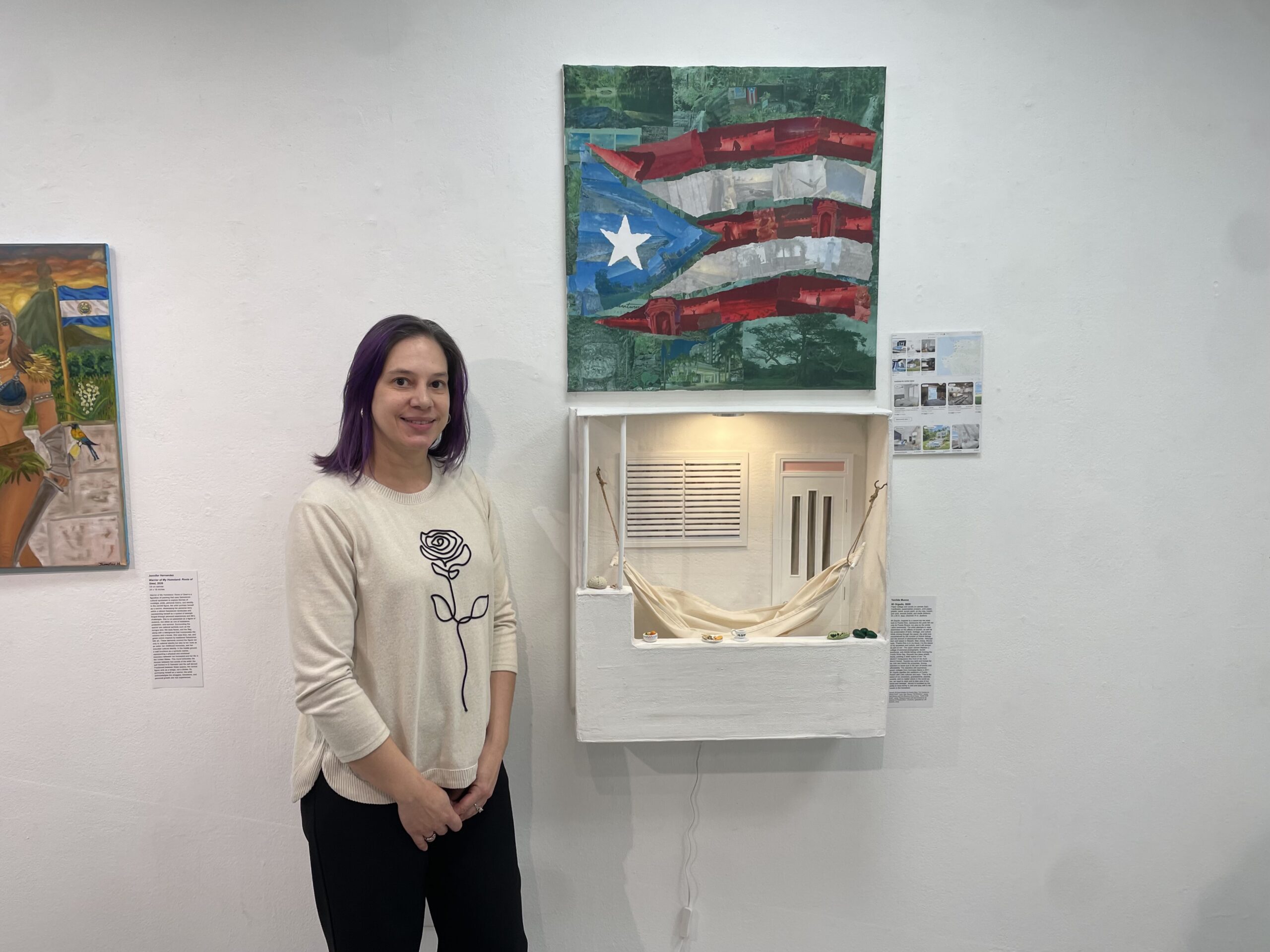 Senior visual arts major Yanilda Munoz with her piece, "Mi Orgullo". 
Rob Ferguson | The Montclarion