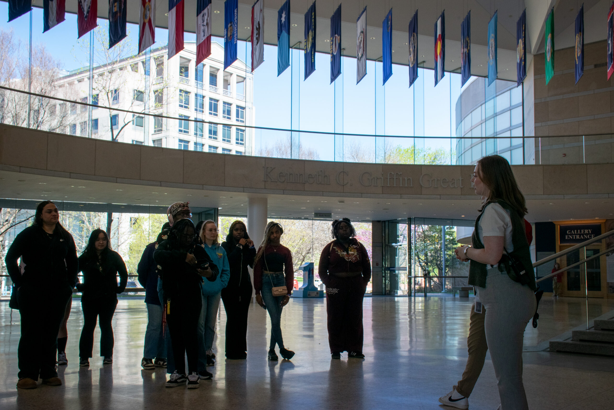 Students and trip attendees gather in the lobby of the National Constitution Center.