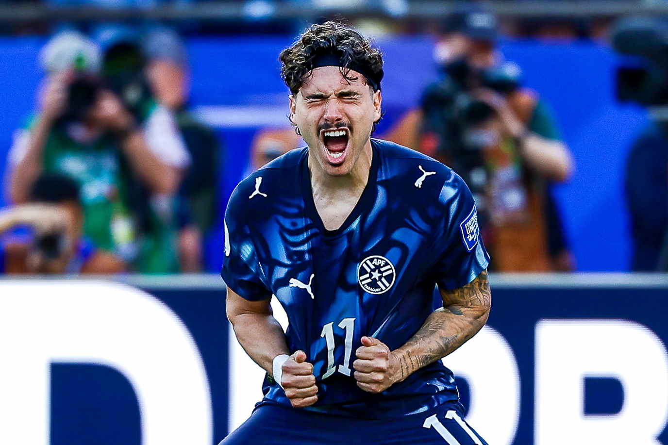 FOXBOROUGH, MA 06/29/2026 FIFA WORLD CUP ROUND OF 32 GERMANY vs PARAGUAY: Mauricio of Paraguay celebrates after scoring his penalty kick during past Germany goalkeeper Manuel Neuer during the shootout at Boston Stadium. - Photo by Irish Maliborski