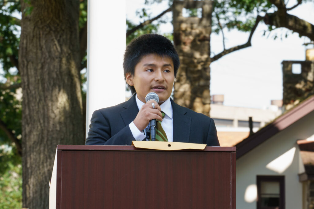Mateo Llano, SGA Vice President candidate, addressing crowd during flag raising ceremony, Wednesday, Sep. 16, 2026.